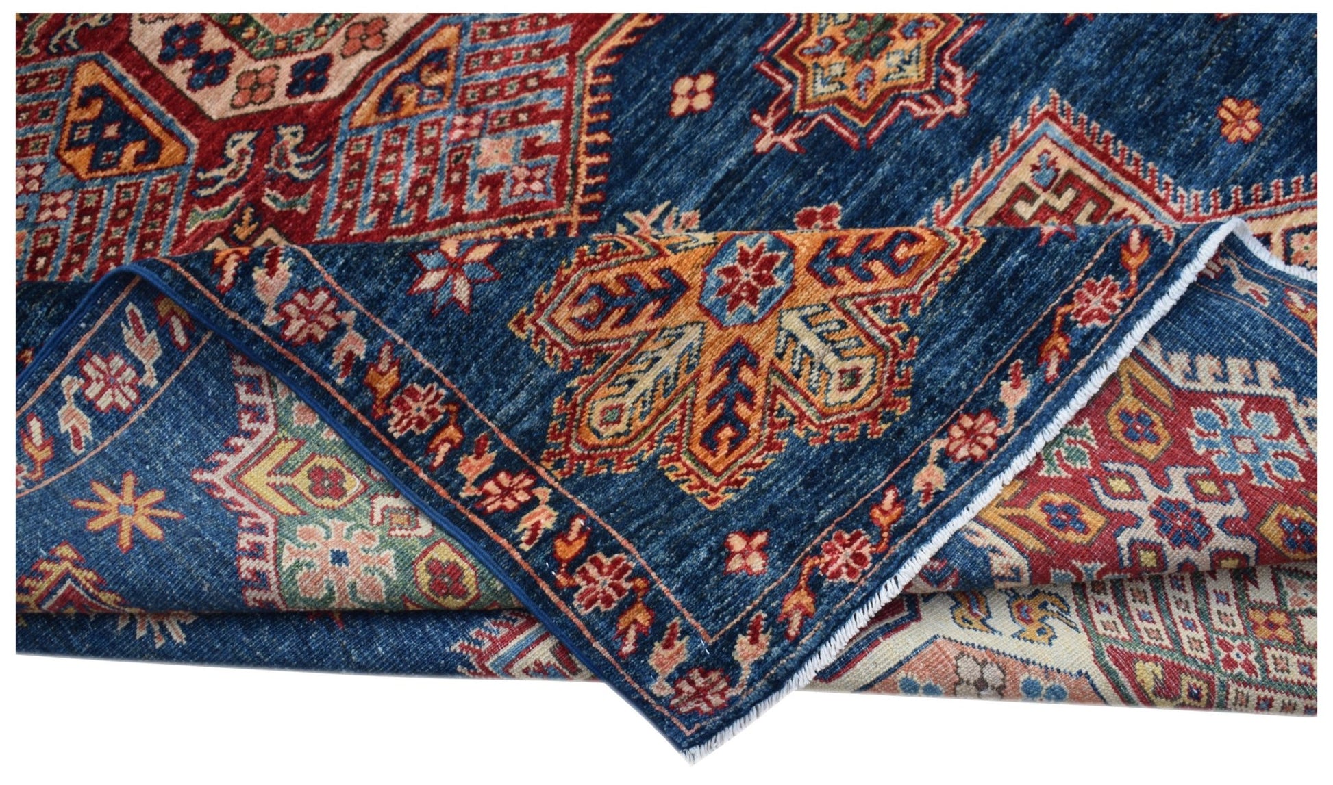A handmade Afghan Super Kazakh rug featuring traditional geometric motifs in blue and red tones.