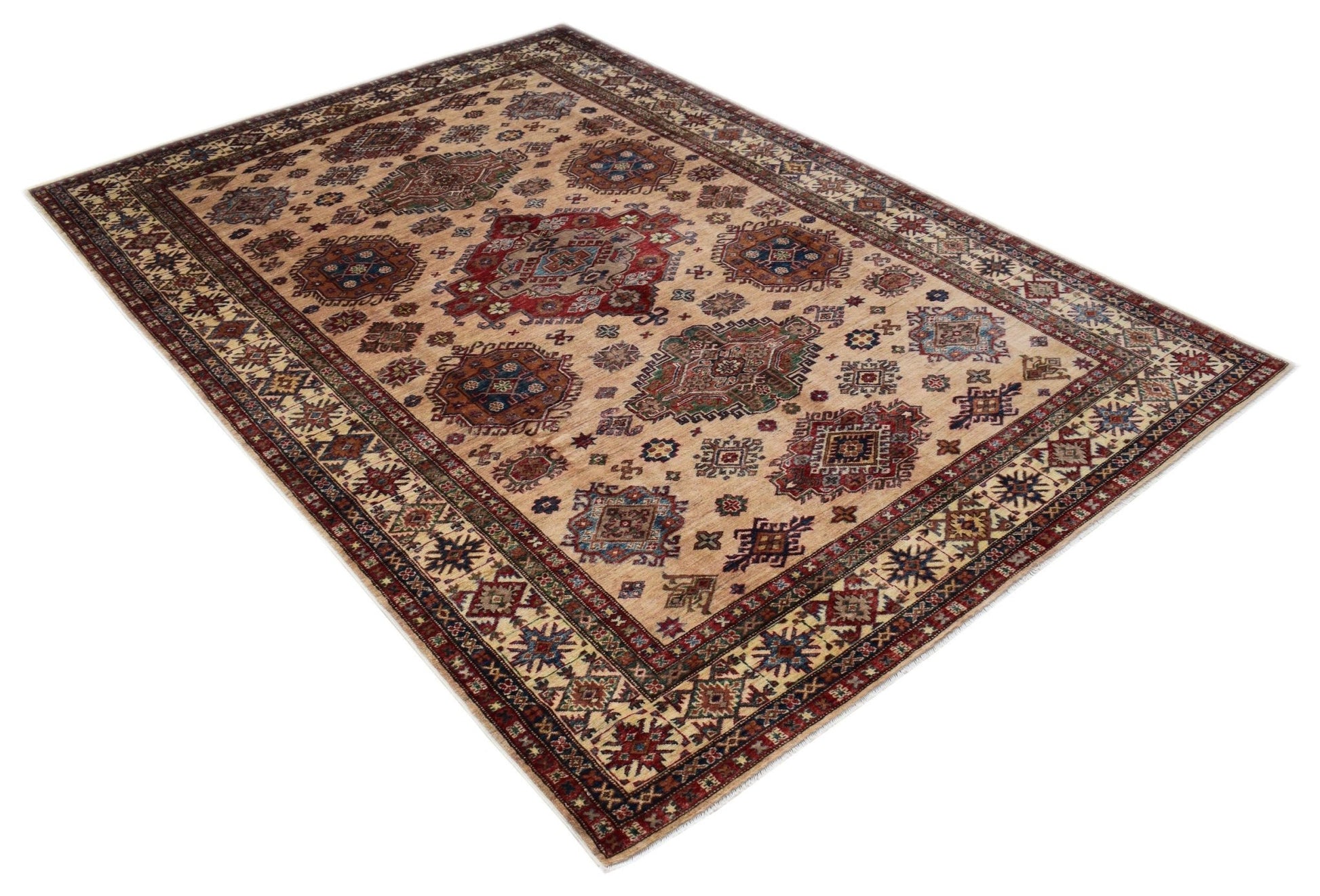 An Afghan Super Kazakh rug featuring traditional geometric motifs in red, blue, and beige tones.