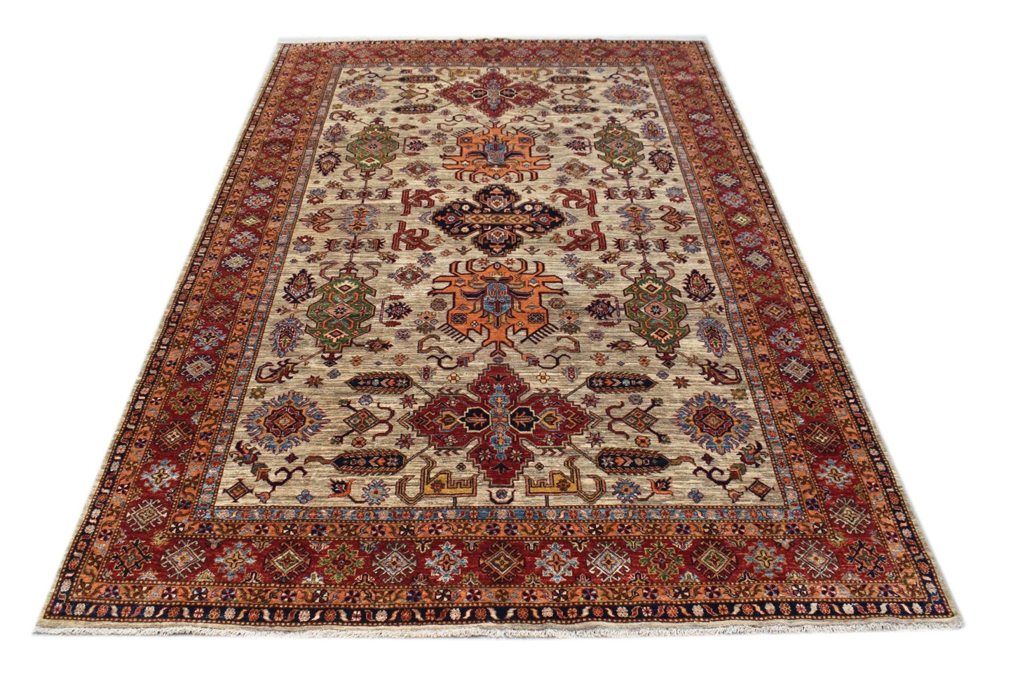Handmade Afghan Super Kazakh rug featuring traditional geometric motifs in red, blue, and orange.