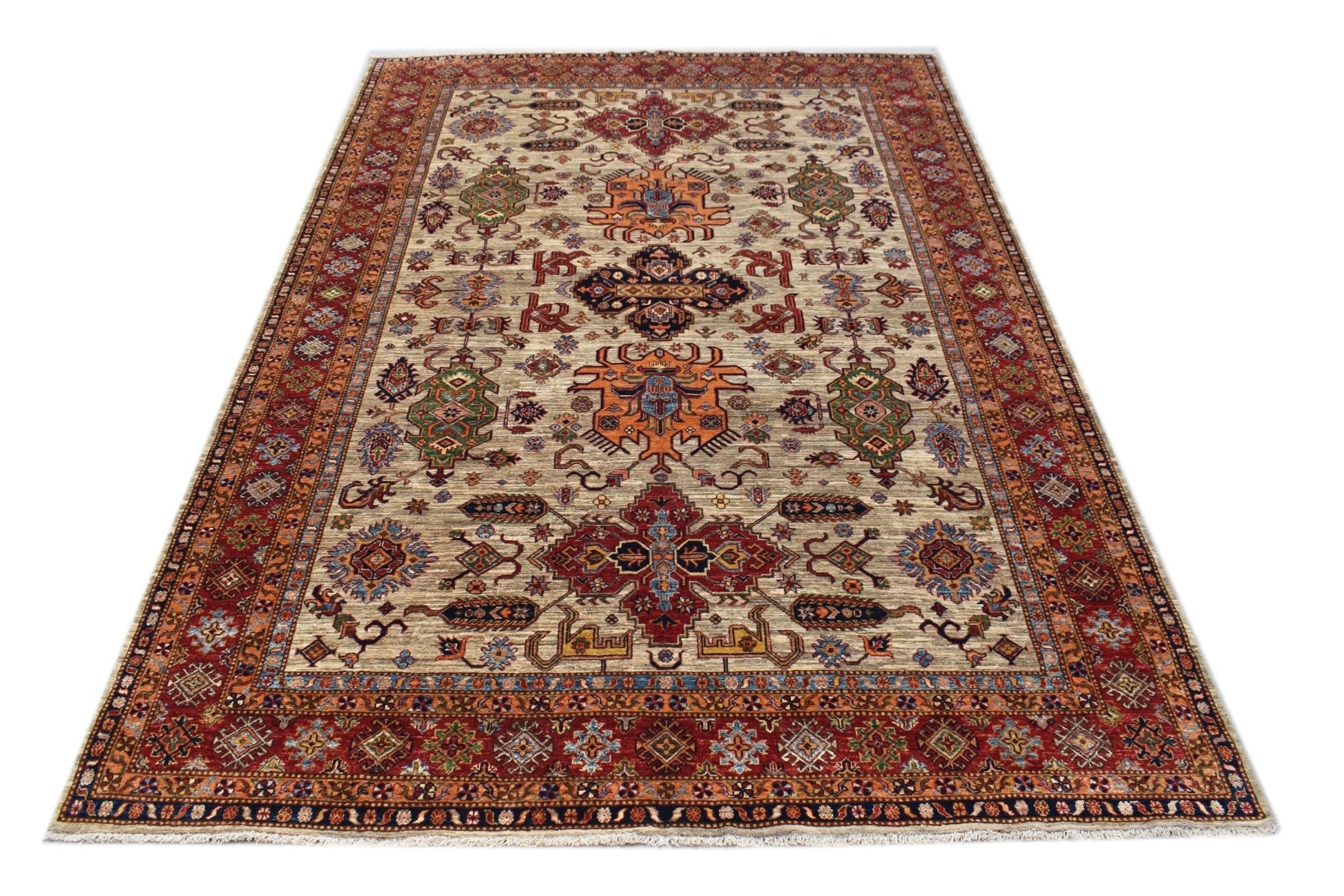 Handmade Afghan Super Kazakh rug featuring traditional geometric motifs in red, blue, and orange.