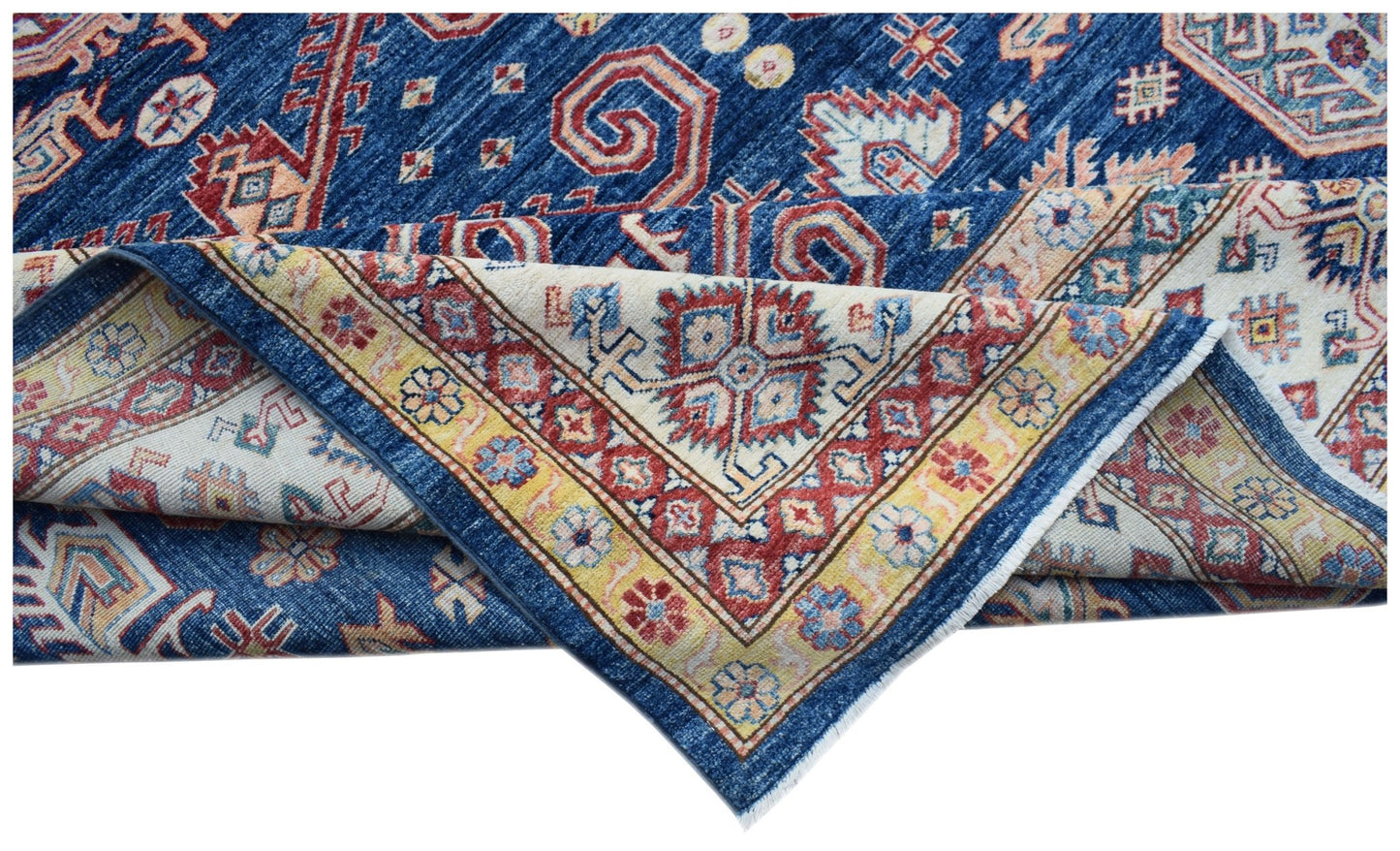 A handmade Afghan Super Kazakh rug featuring traditional geometric motifs in blue, red, and cream.