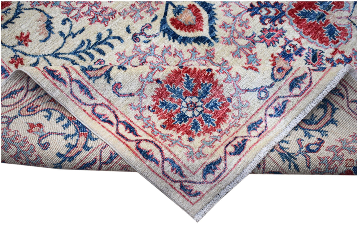 A handmade Afghan Chobi rug featuring a traditional Suzani floral pattern in red and blue tones.