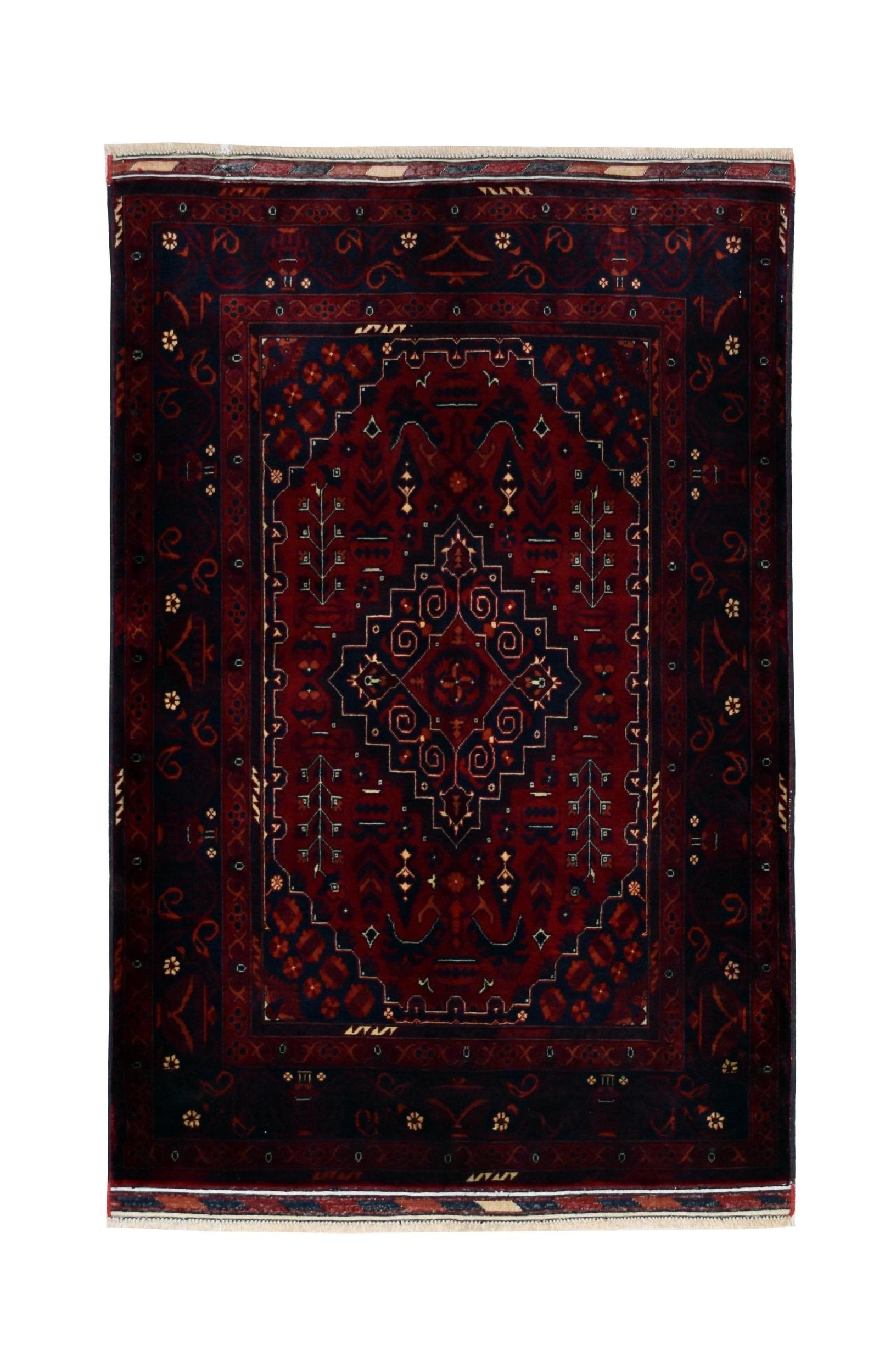 Handmade Afghan Biljik wool rug featuring a deep red and blue geometric pattern.