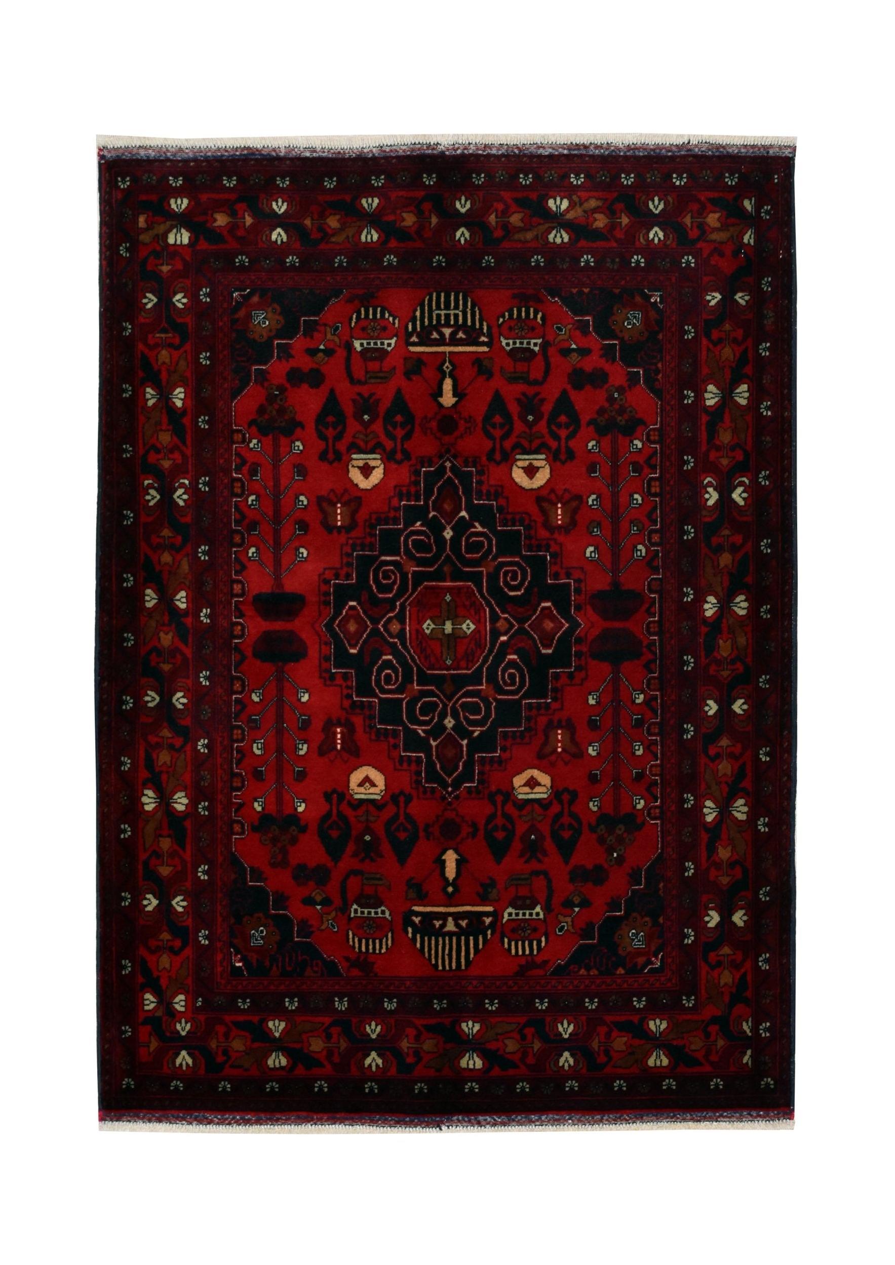 Handmade Afghan Biljik wool rug featuring a geometric pattern in deep red and black tones.
