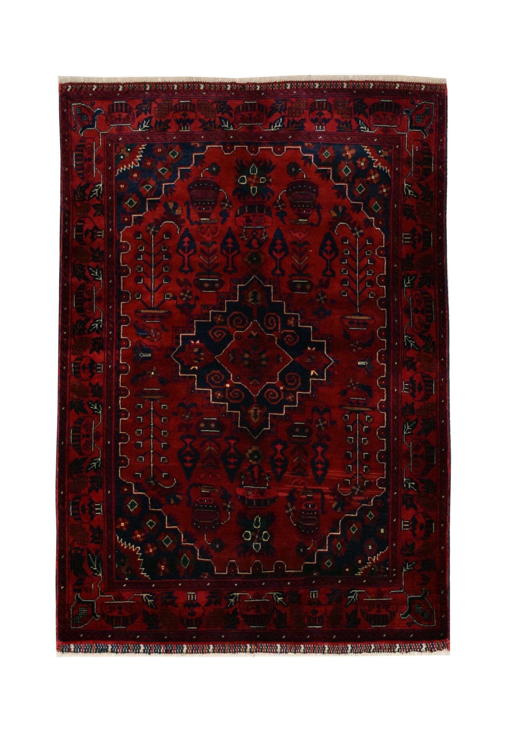 Handmade Afghan Biljik rug featuring a deep red field with intricate blue geometric patterns.