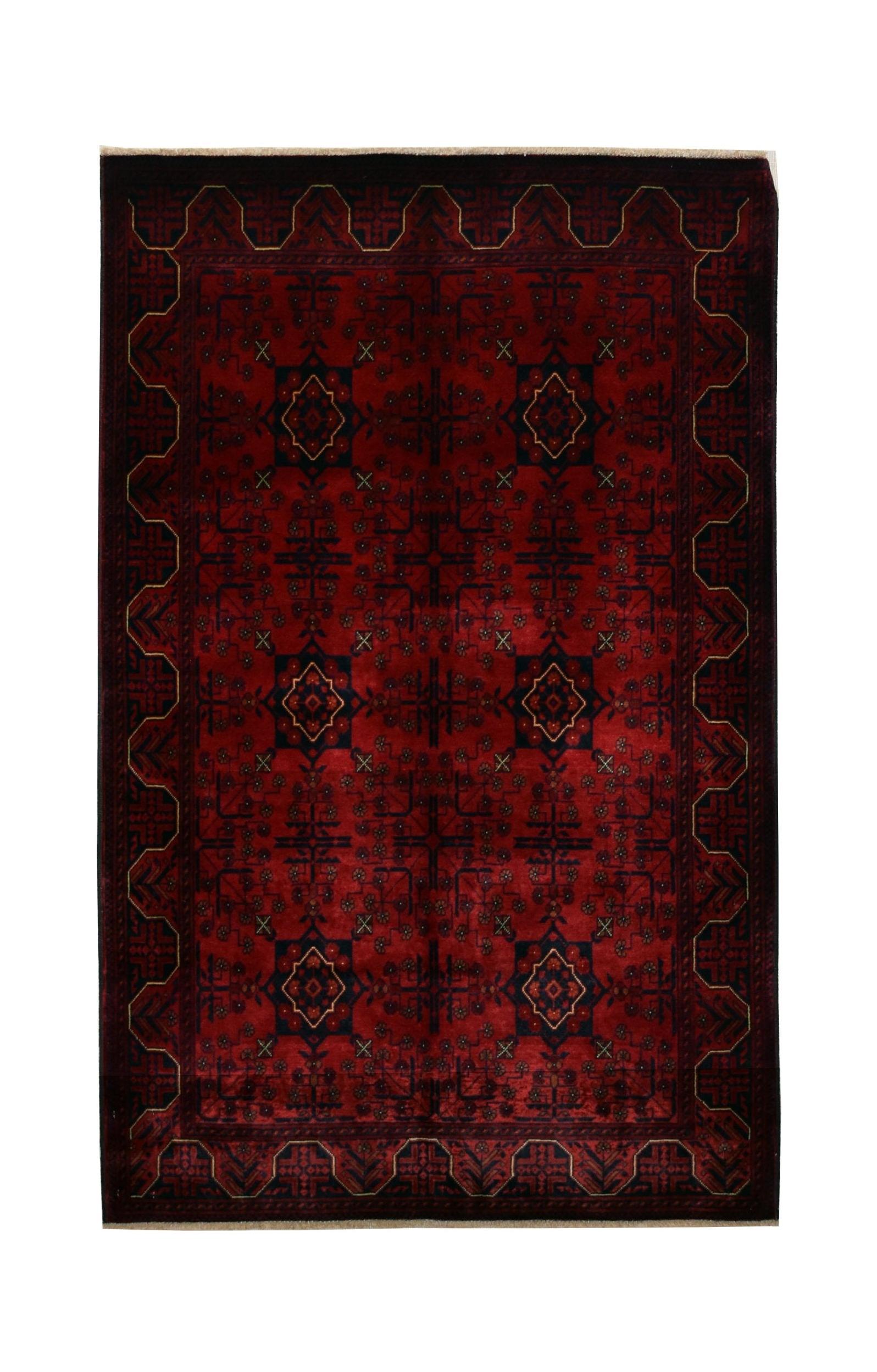 A handmade Afghan Biljik rug featuring a deep red field with dark blue geometric patterns.