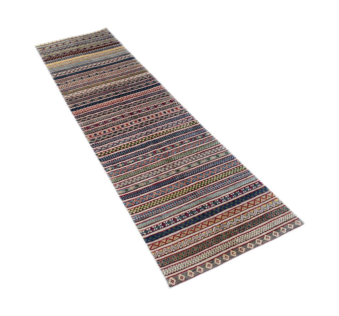 An Afghan Yekta runner rug featuring a vibrant, multi-colored striped pattern with geometric motifs.