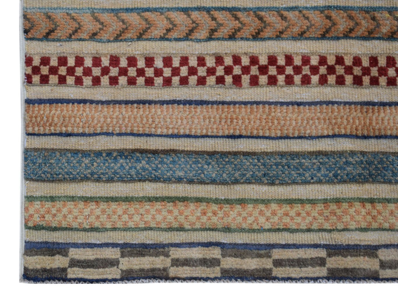 Handmade Afghan runner rug featuring horizontal bands of geometric patterns in earthy tones.
