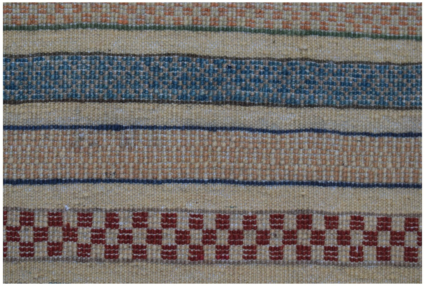 A handmade Afghan runner featuring horizontal stripes in red, blue, and tan wool.