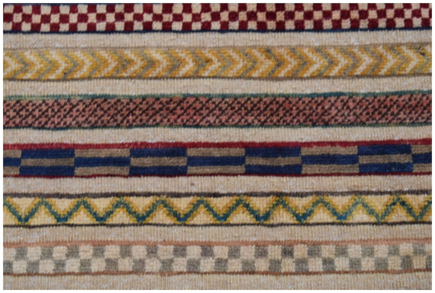 Afghan Yekta runner with horizontal stripes of geometric patterns.