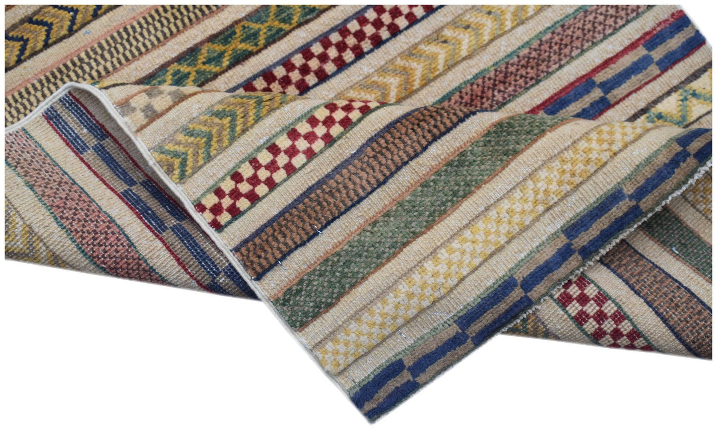 An Afghan Yekta runner featuring a striped pattern with geometric textures in earthy tones.