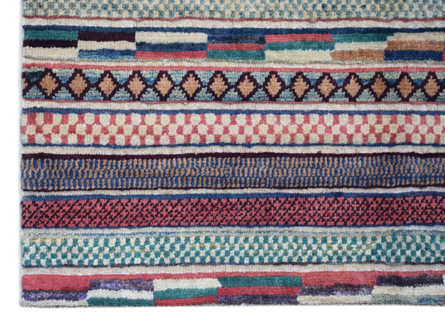 Handmade Afghan Yekta runner featuring a series of colorful, textured geometric patterned stripes.