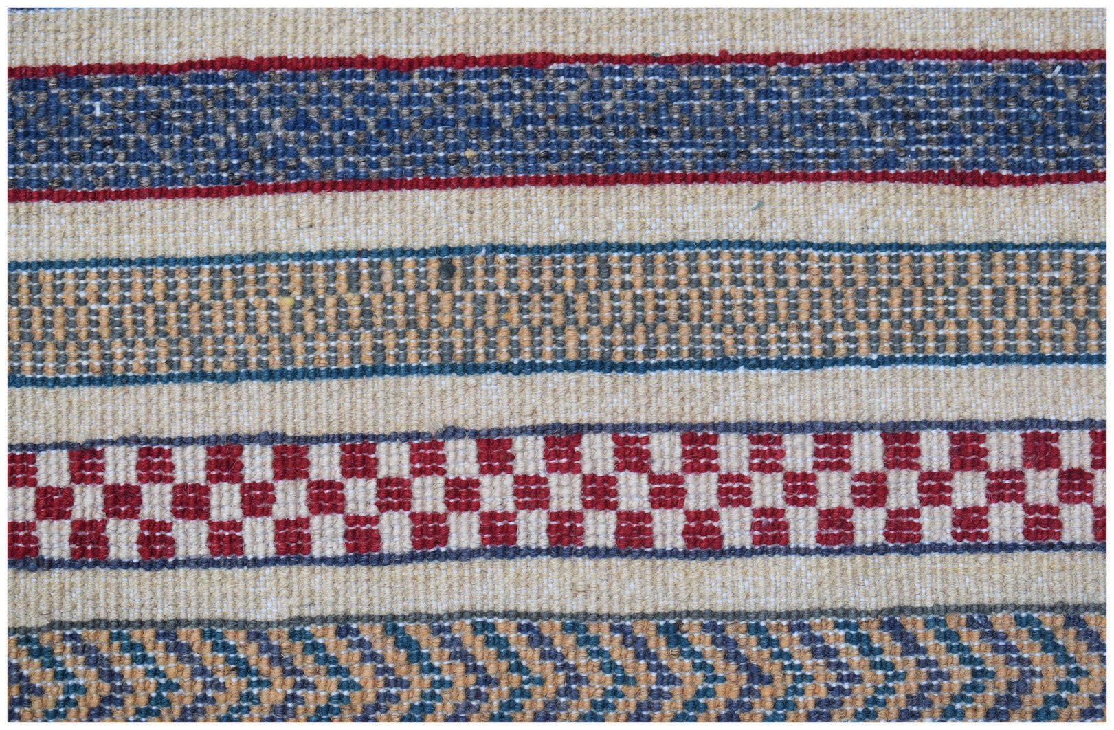 Handmade Afghan Yekta rug featuring horizontal bands of geometric patterns in red, blue, and tan.