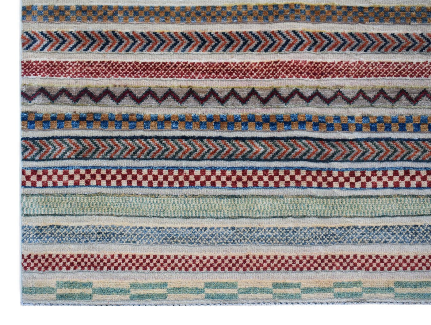 Handmade Afghan Yekta rug featuring a series of colorful, textured geometric and striped patterns.