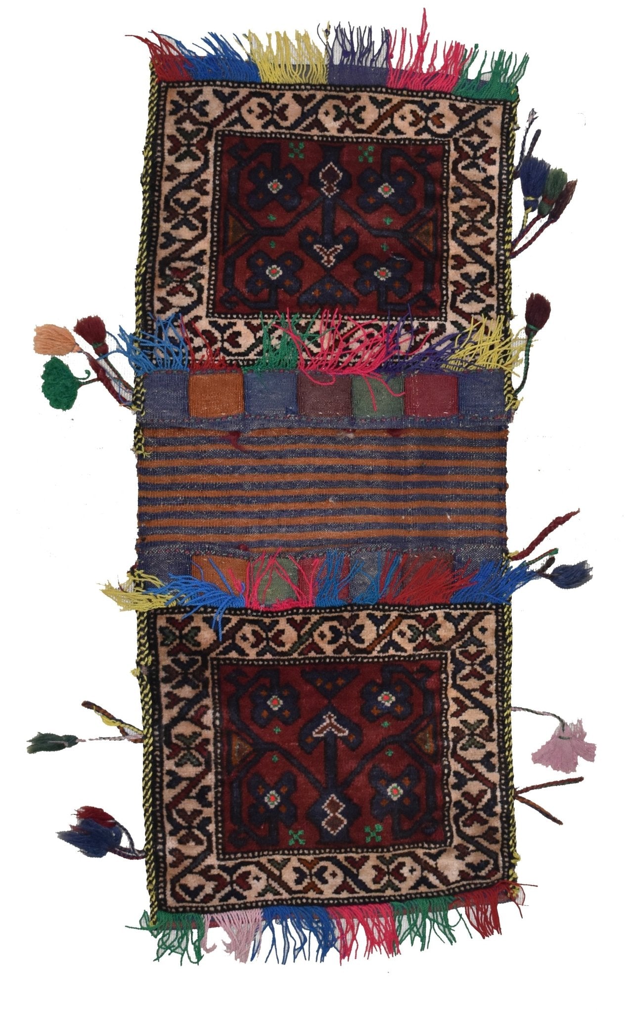 A vintage handmade Afghan wool saddle bag featuring two patterned panels connected by striped fabric.