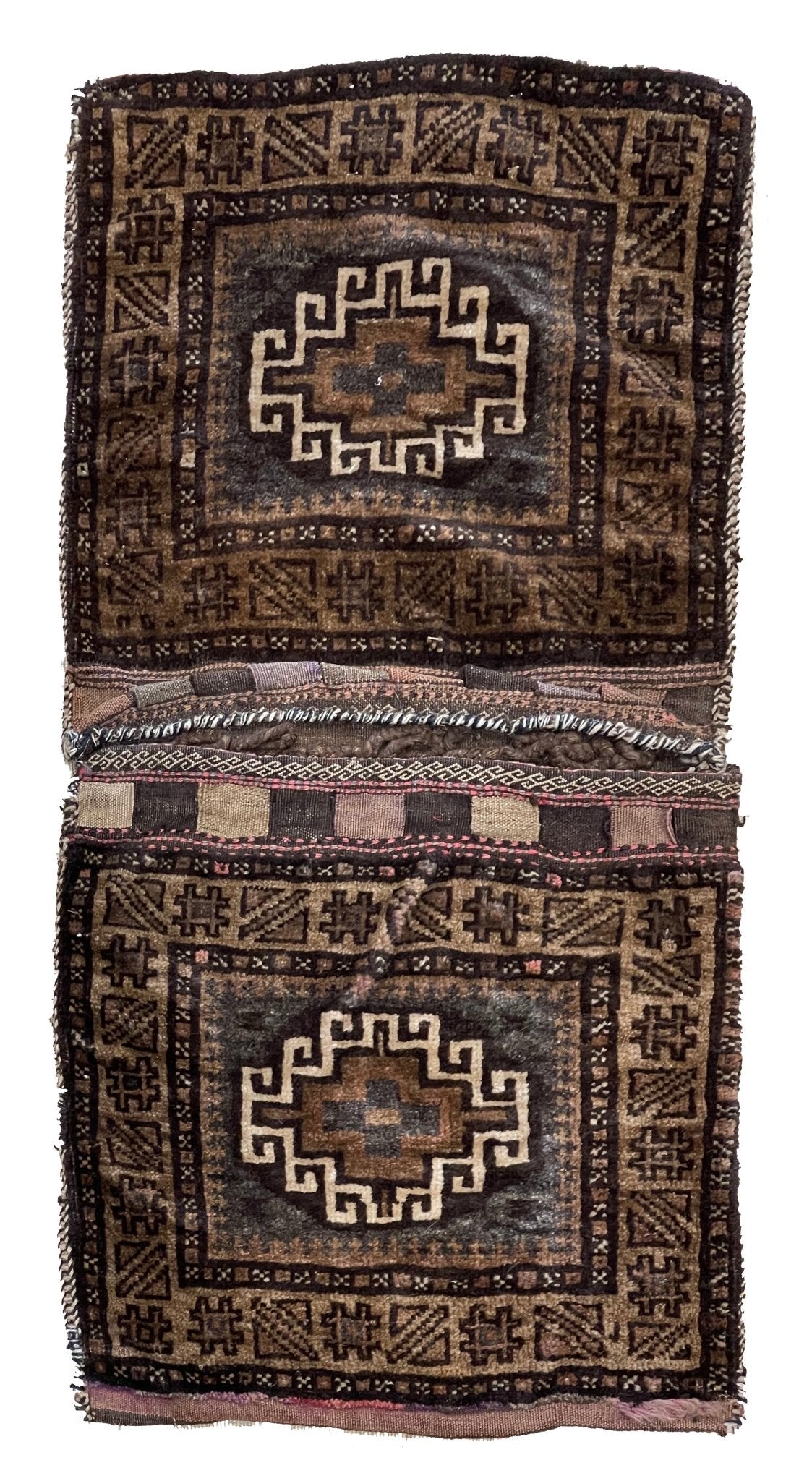 A handmade vintage Afghan wool saddle bag featuring two matching panels with geometric patterns.