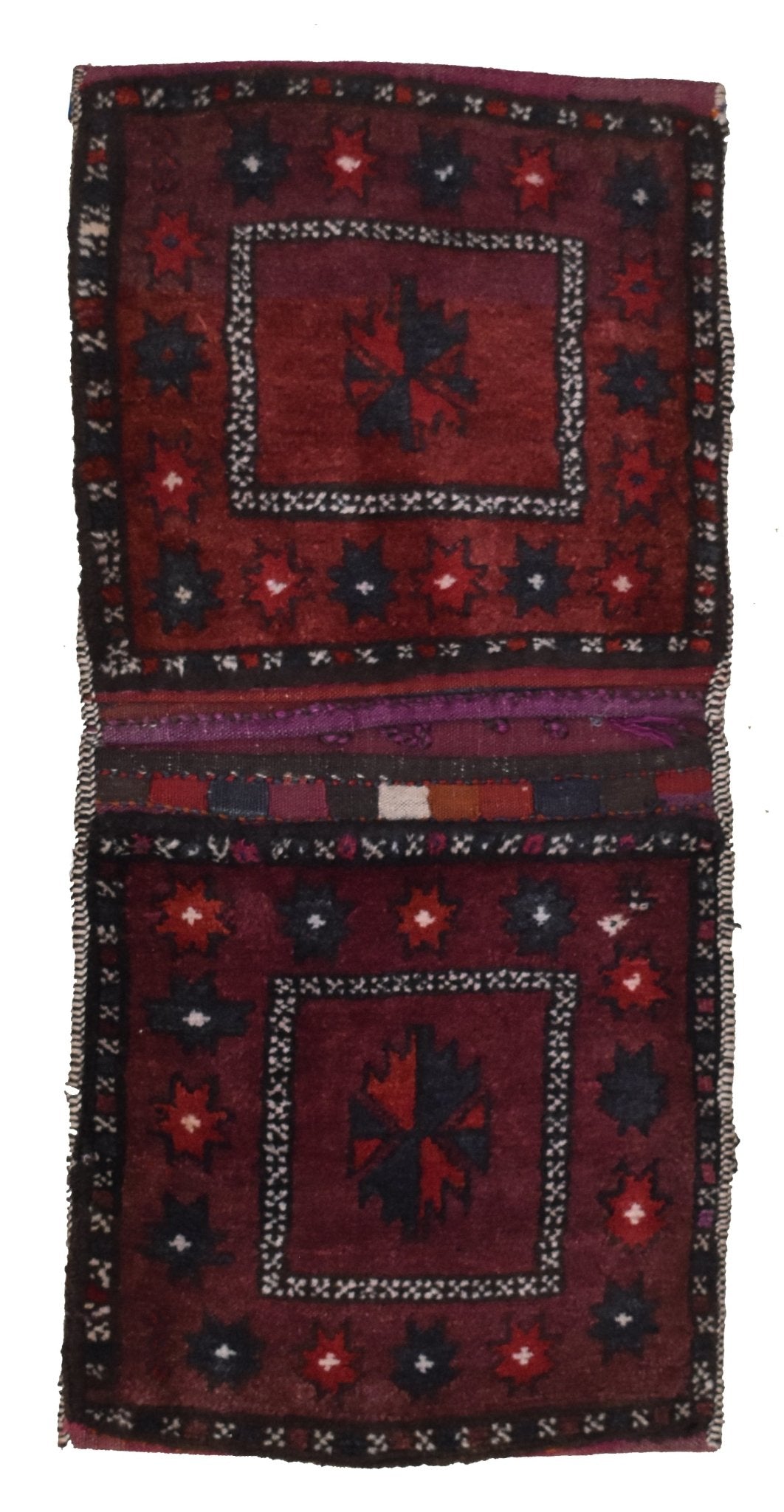 A handmade vintage Afghan wool saddle bag featuring two square panels with geometric star motifs.