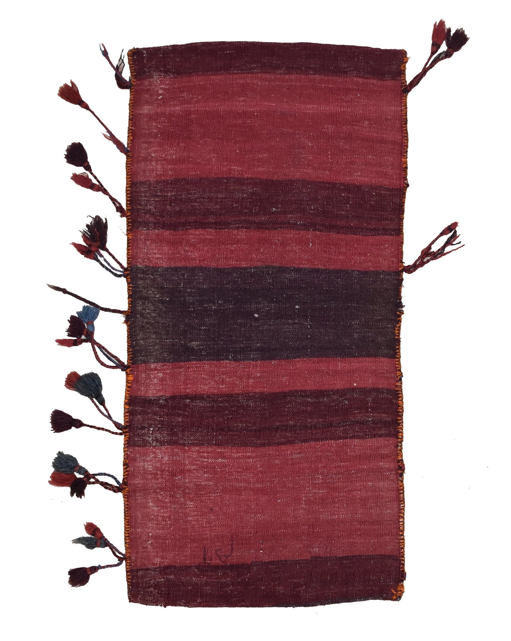 A vintage handmade Afghan wool saddle bag featuring horizontal red and dark brown stripes.