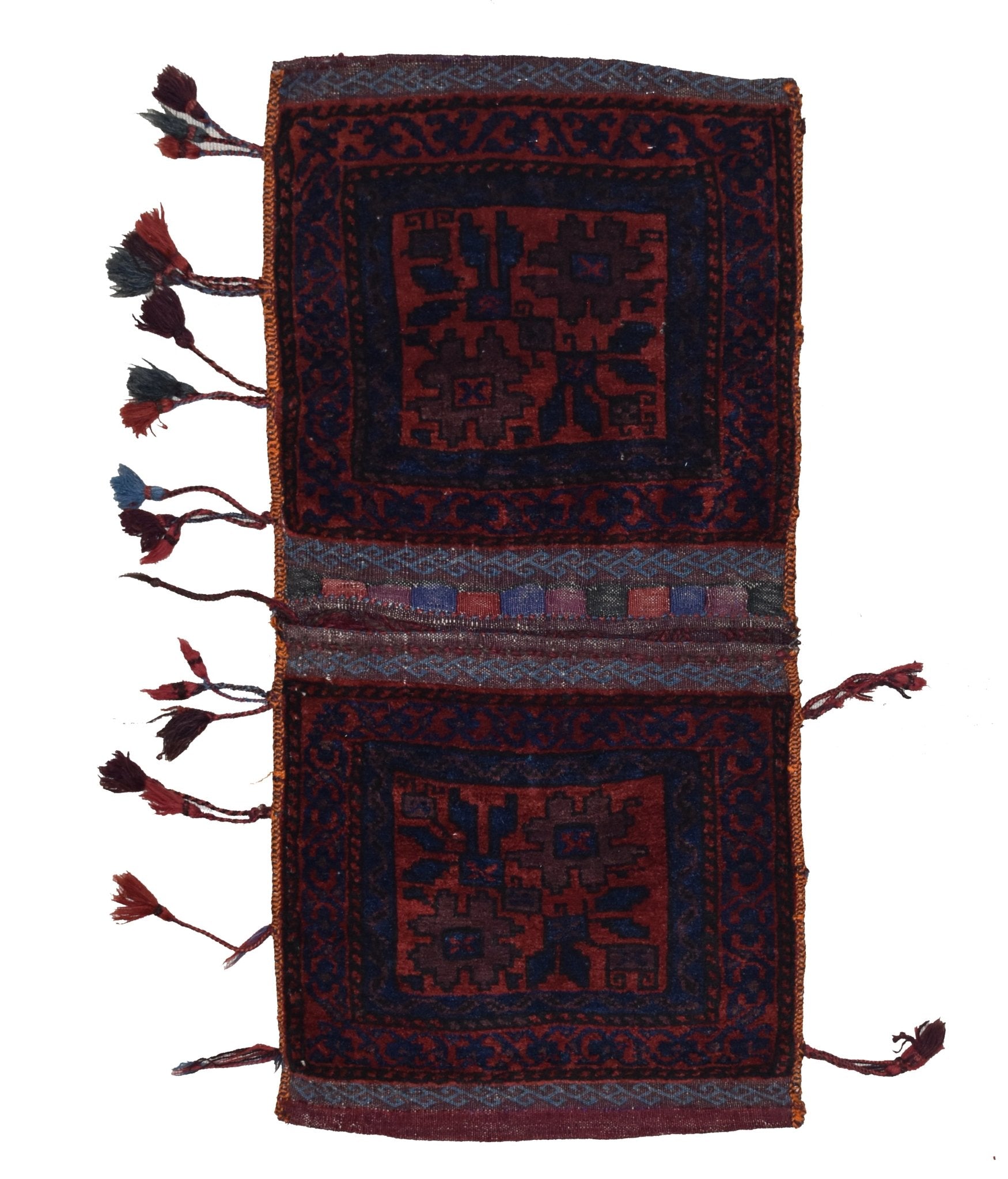 A handmade vintage Afghan wool saddle bag featuring two matching dark red and blue tribal panels.