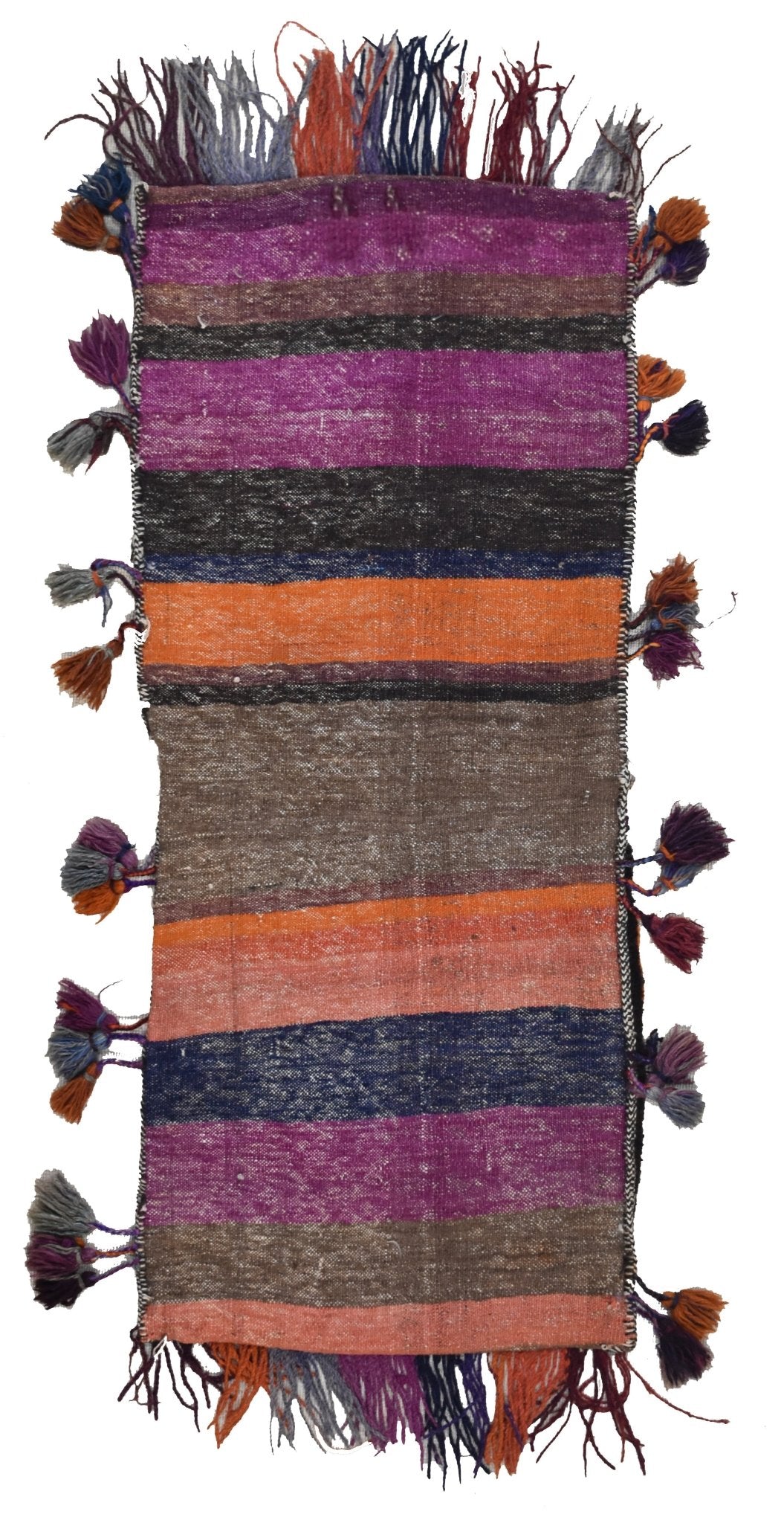 A handmade vintage Afghan wool saddle bag featuring colorful horizontal stripes and side tassels.