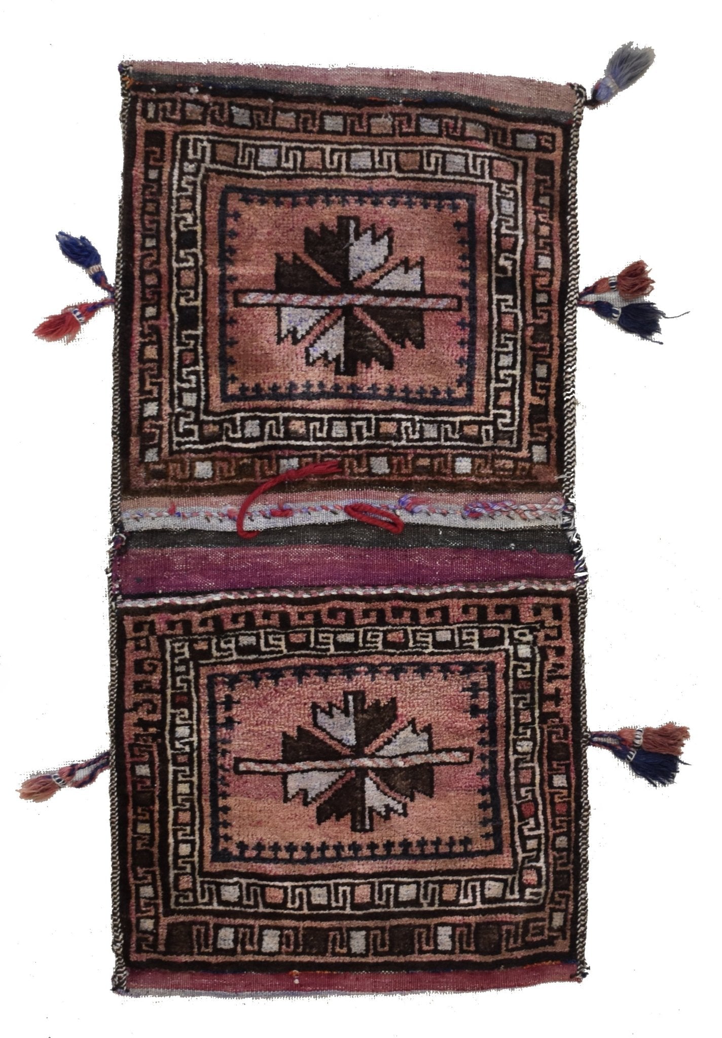 A handmade vintage Afghan wool saddle bag featuring two matching geometric patterned panels.