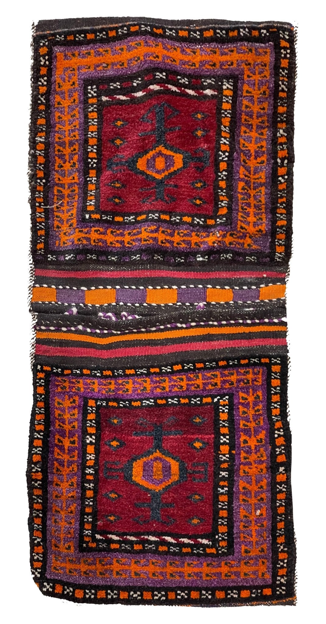 A handmade vintage Afghan wool saddle bag featuring two square panels with geometric tribal motifs.