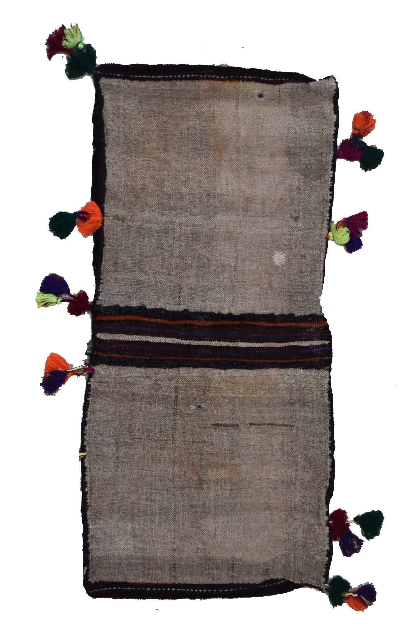 A vintage handmade Afghan wool saddle bag featuring a neutral woven pattern and colorful tassels.