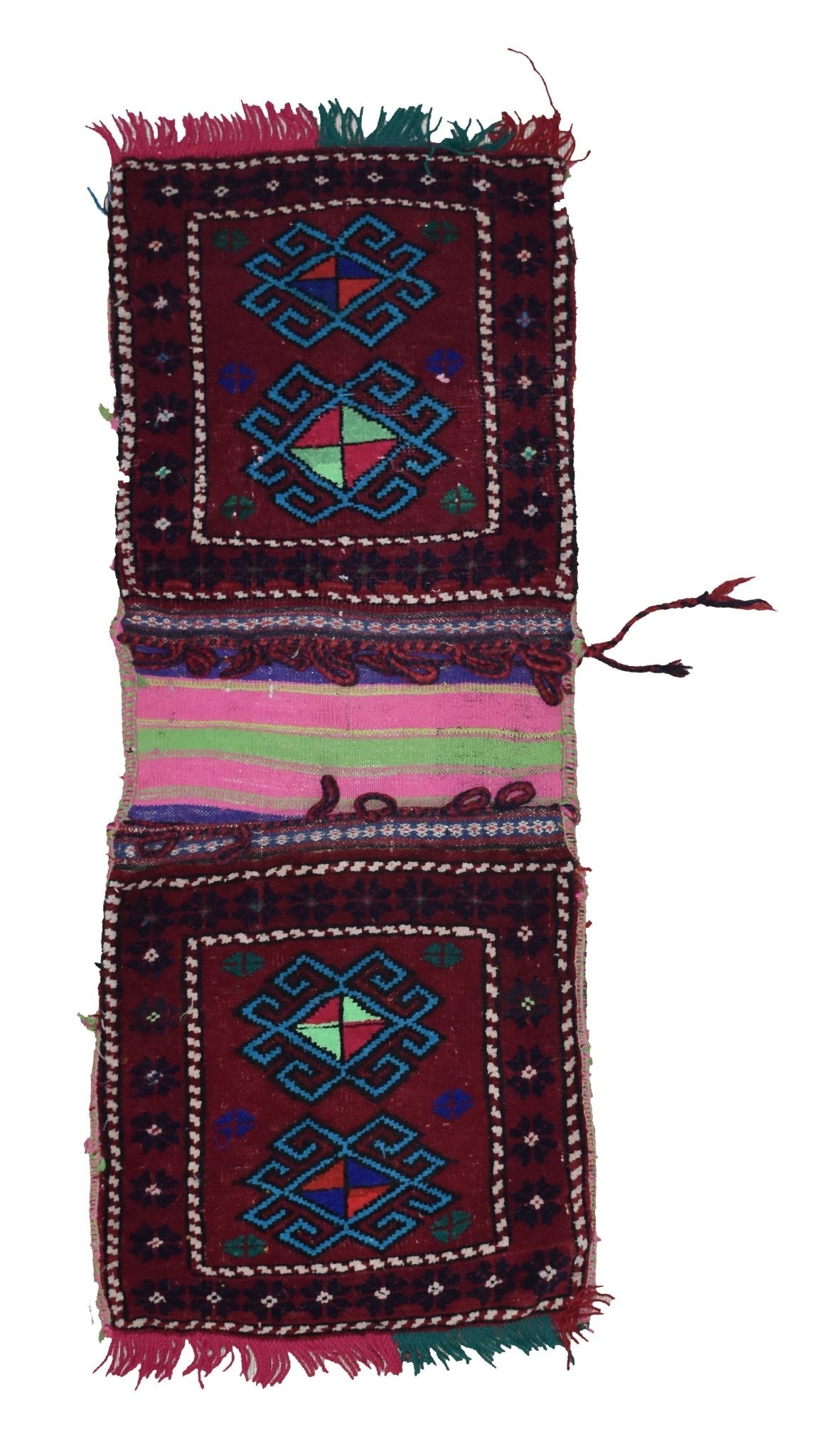 A vintage handmade Afghan wool saddle bag featuring two deep red panels with geometric motifs.