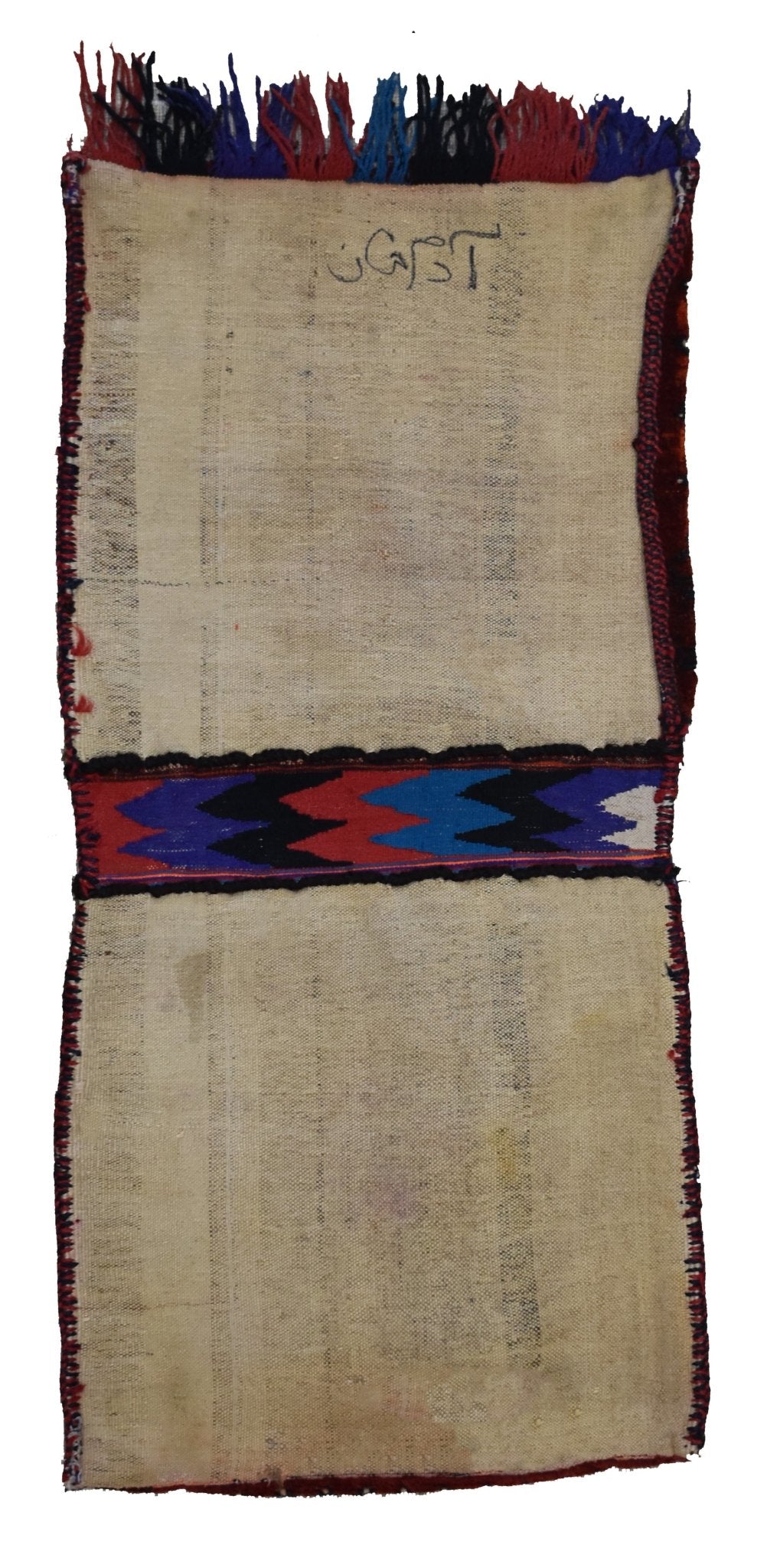 A vintage handmade Afghan wool saddle bag featuring a central geometric band and fringed ends.