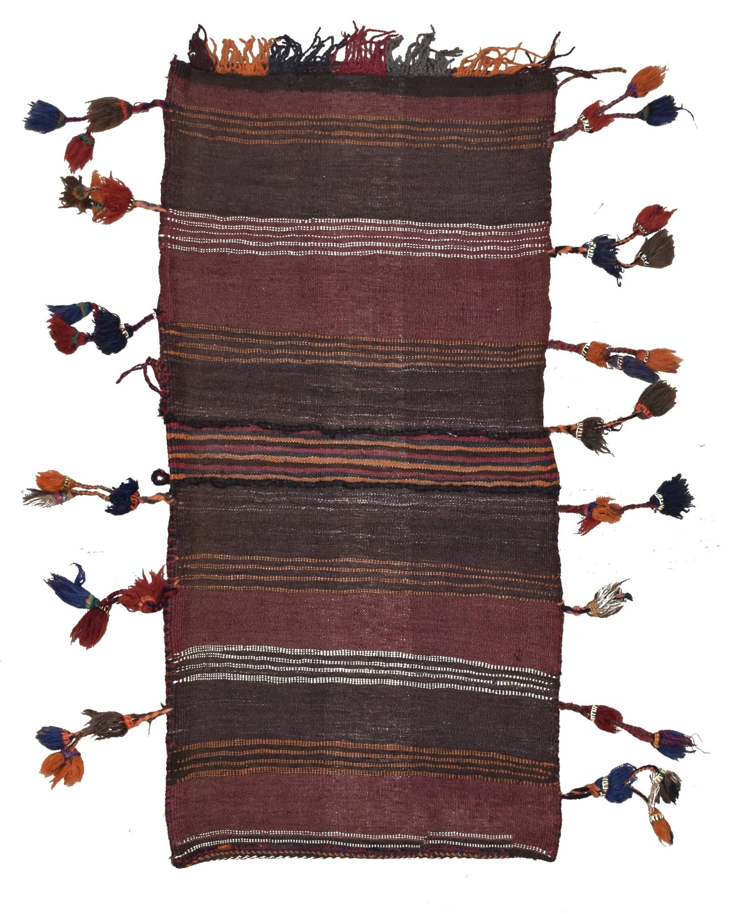 A vintage handmade Afghan wool saddle bag featuring dark striped patterns and decorative tassels.
