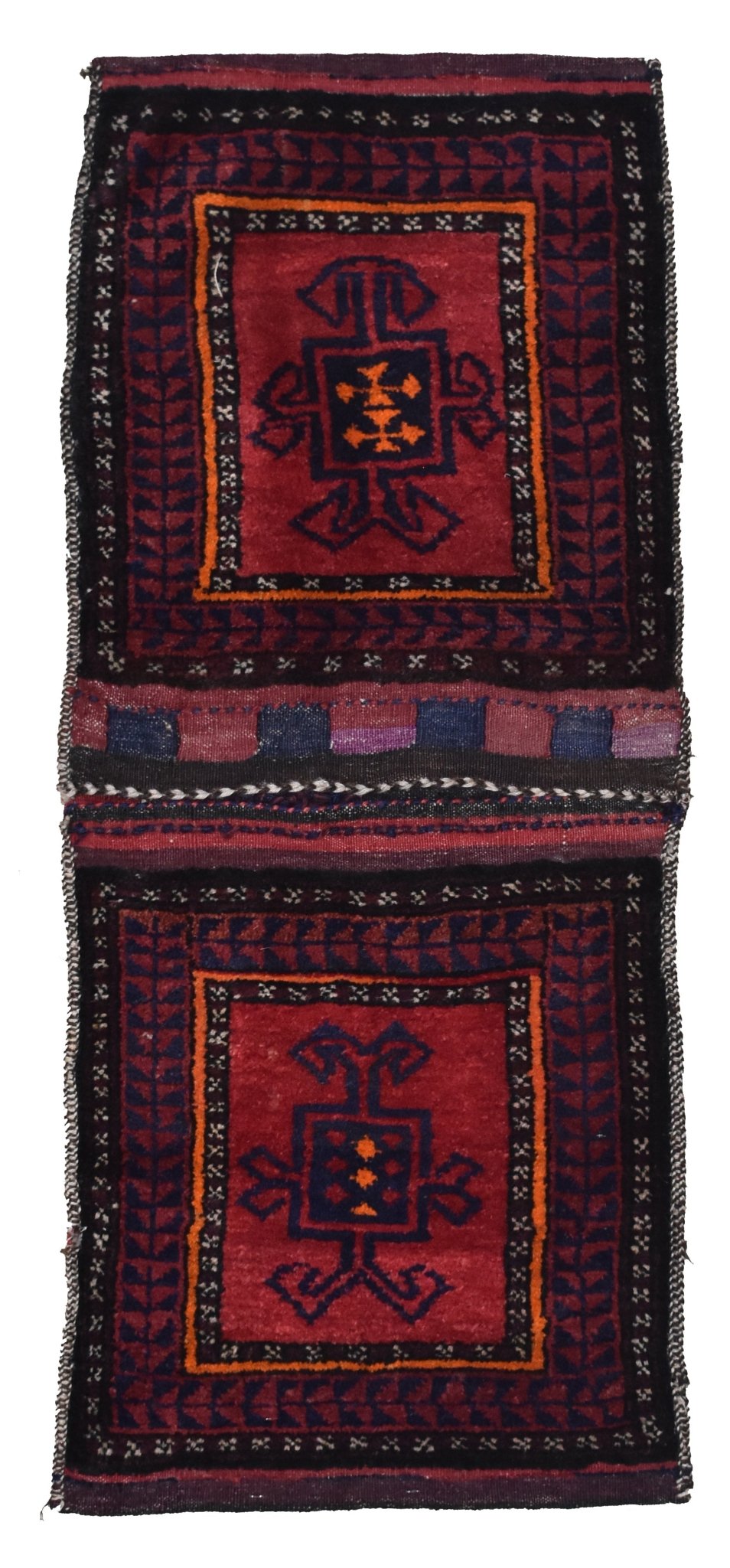 A handmade vintage Afghan wool saddle bag featuring two rectangular panels with geometric motifs.