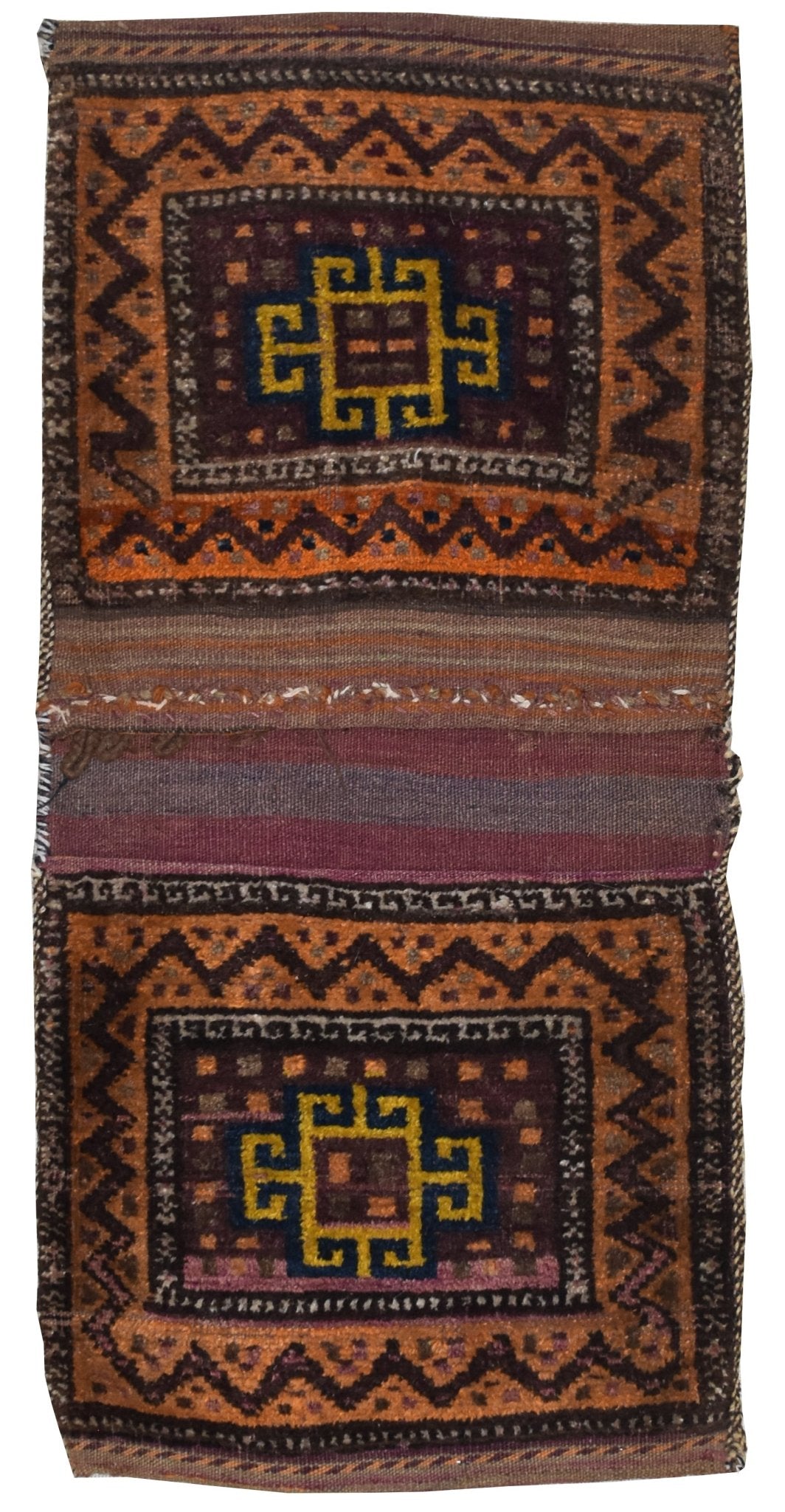 A vintage handmade Afghan wool saddle bag featuring two matching panels with geometric motifs.
