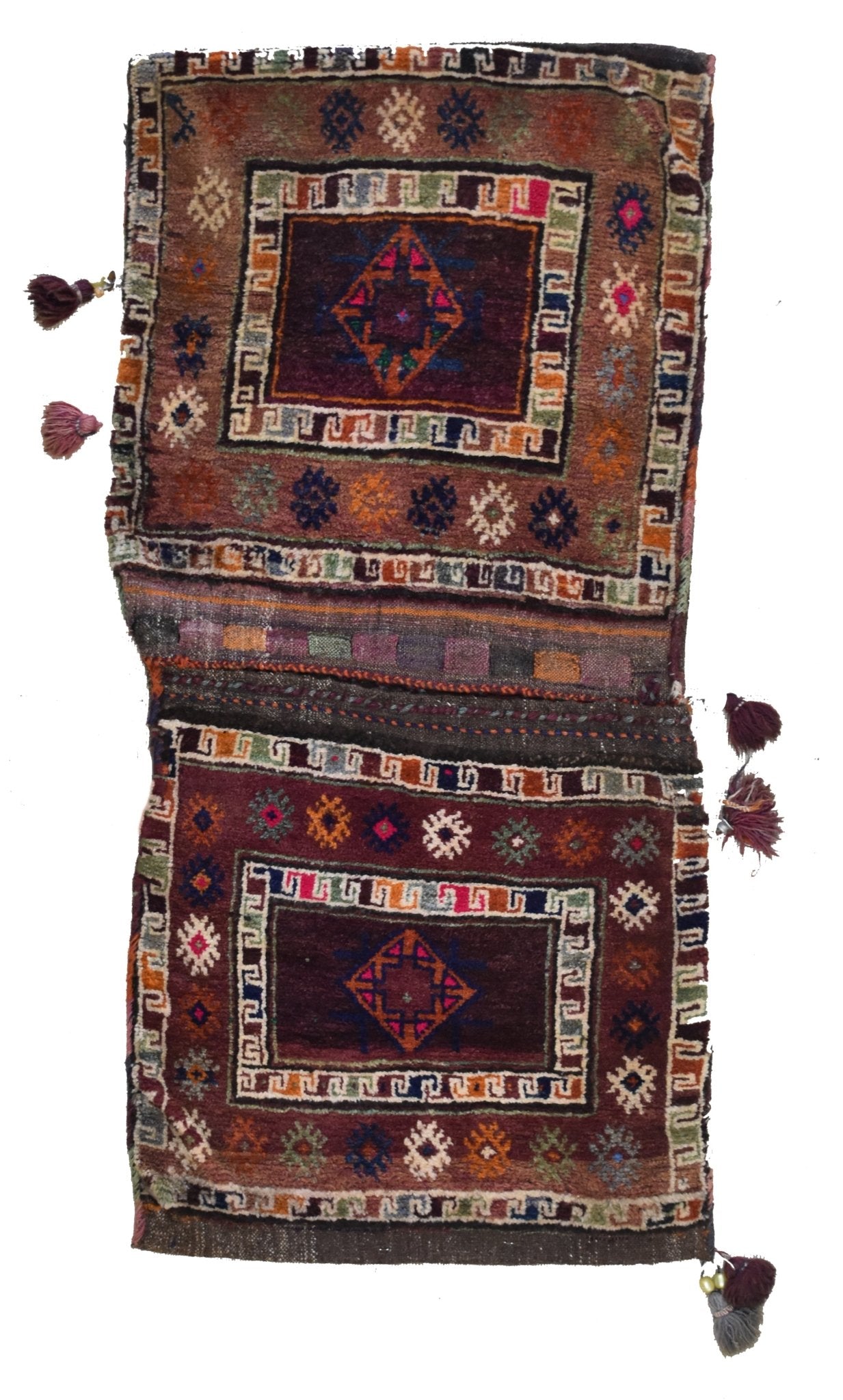 A handmade vintage Afghan wool saddle bag featuring two rectangular panels with geometric motifs.