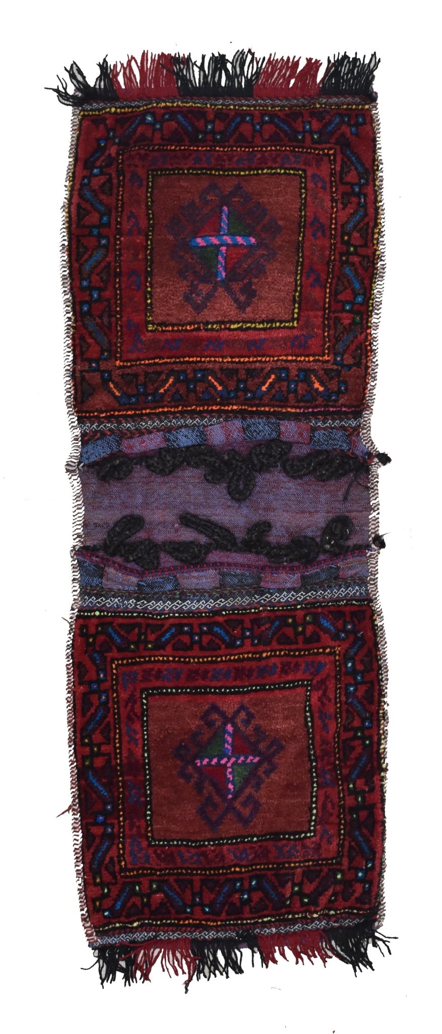 A handmade vintage Afghan wool saddle bag featuring two red panels with geometric tribal motifs.