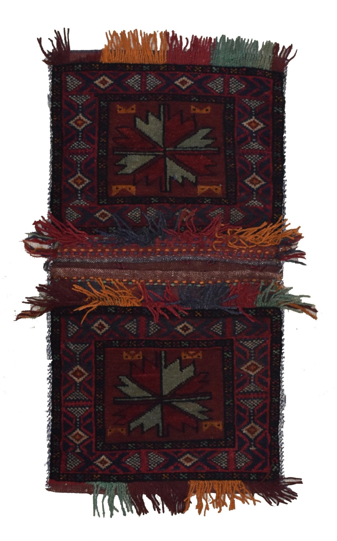 A handmade vintage Afghan wool saddle bag featuring two matching panels with geometric motifs.