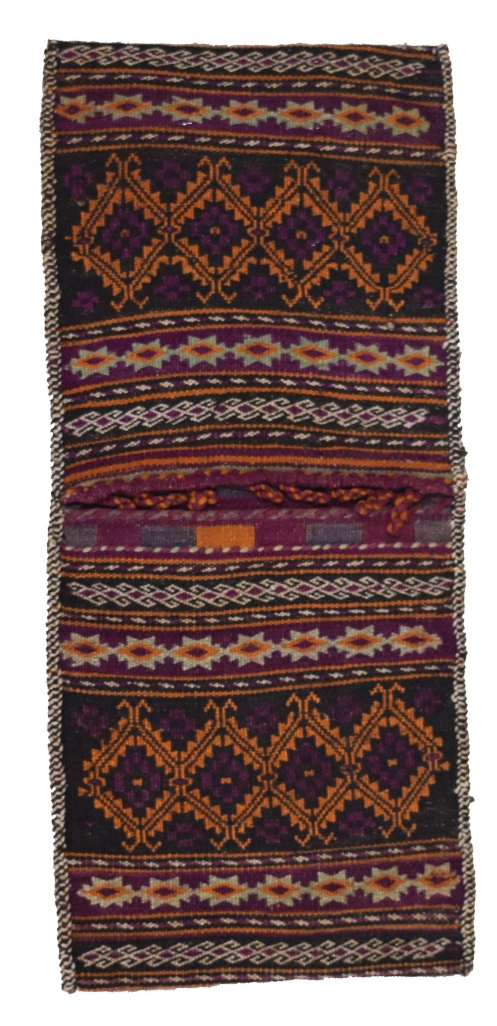 A vintage handmade Afghan wool saddle bag featuring geometric patterns in purple, orange, and black.