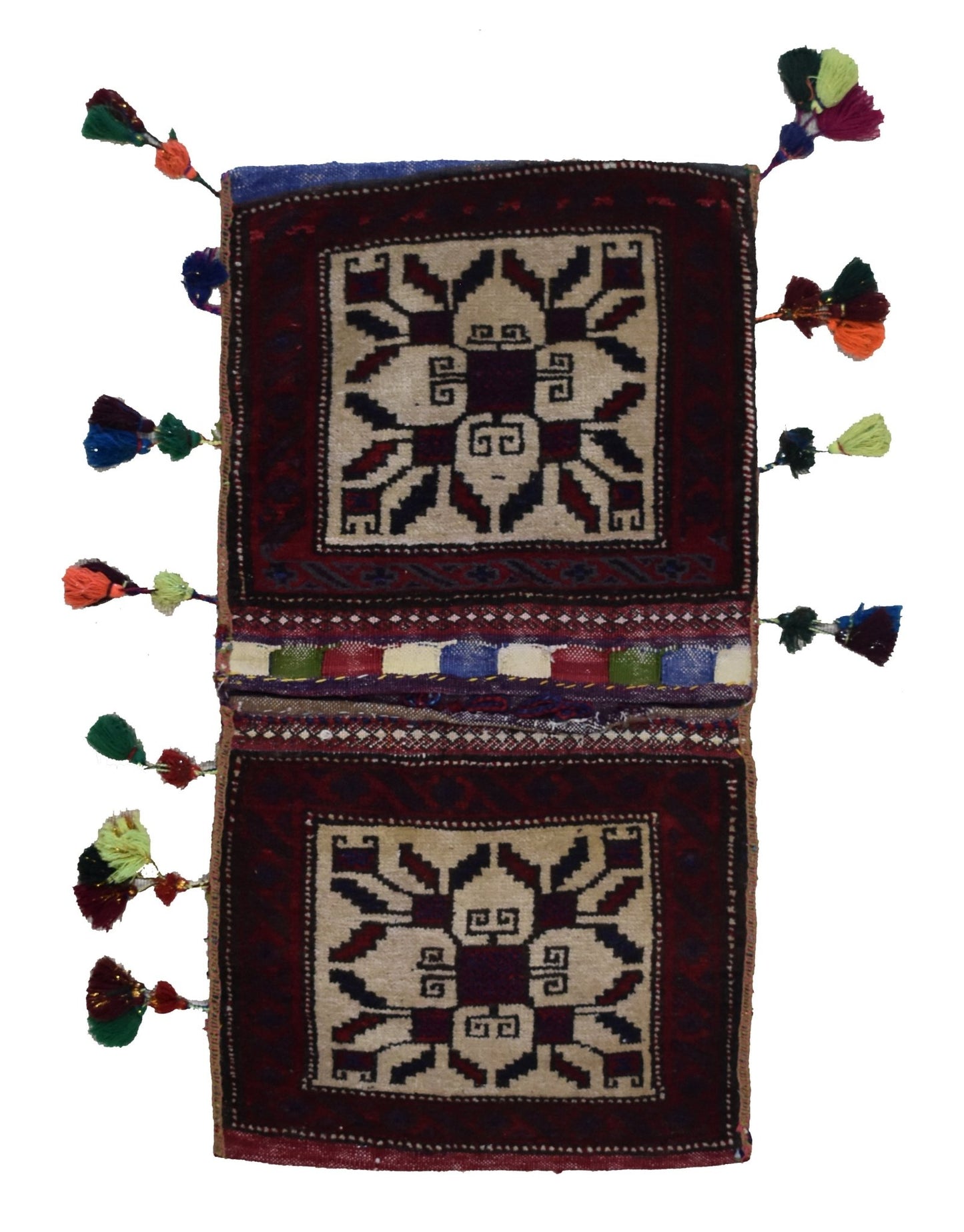 A handmade vintage Afghan wool saddle bag featuring two square panels with geometric motifs.