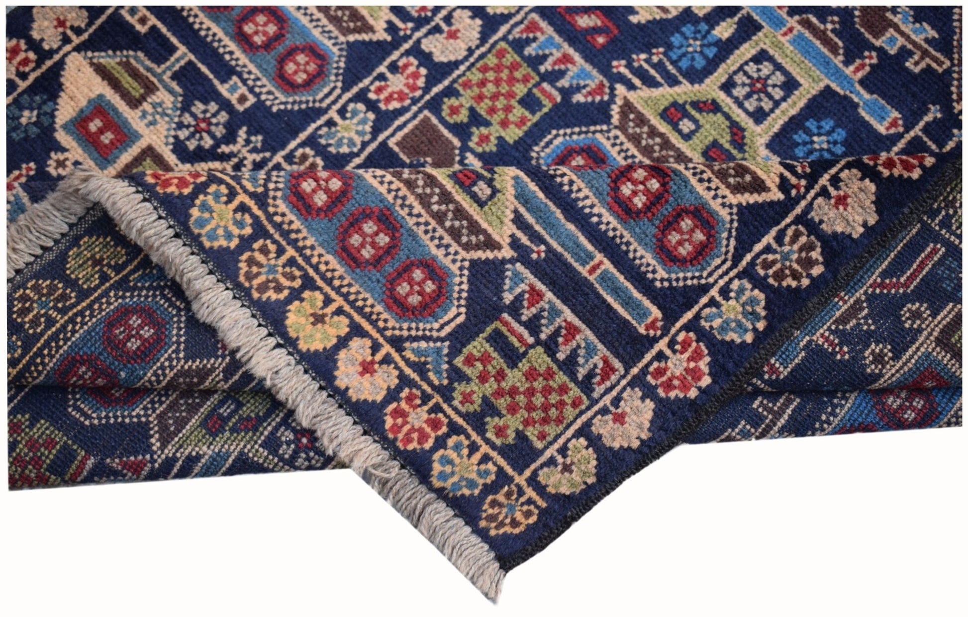 Handmade Afghan Pashm rug featuring a dark blue field with intricate geometric and floral motifs.