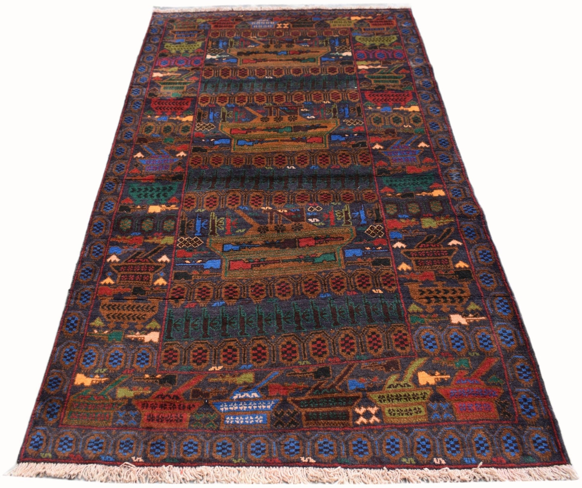 Handmade Afghan wool rug featuring a dark background with woven military tank and weapon motifs.