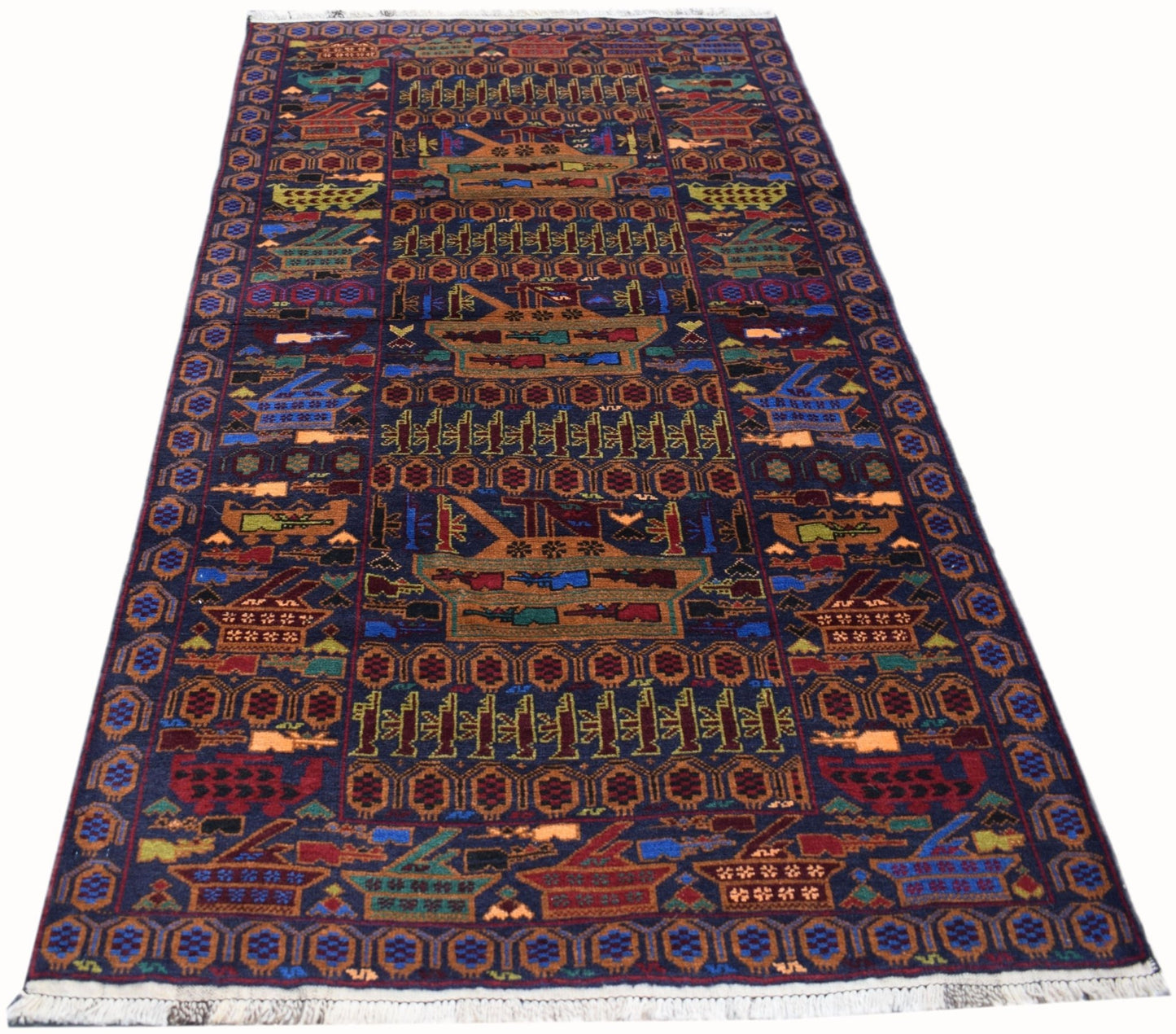 Handmade Afghan wool rug featuring a dark blue field with repeating war-themed motifs.