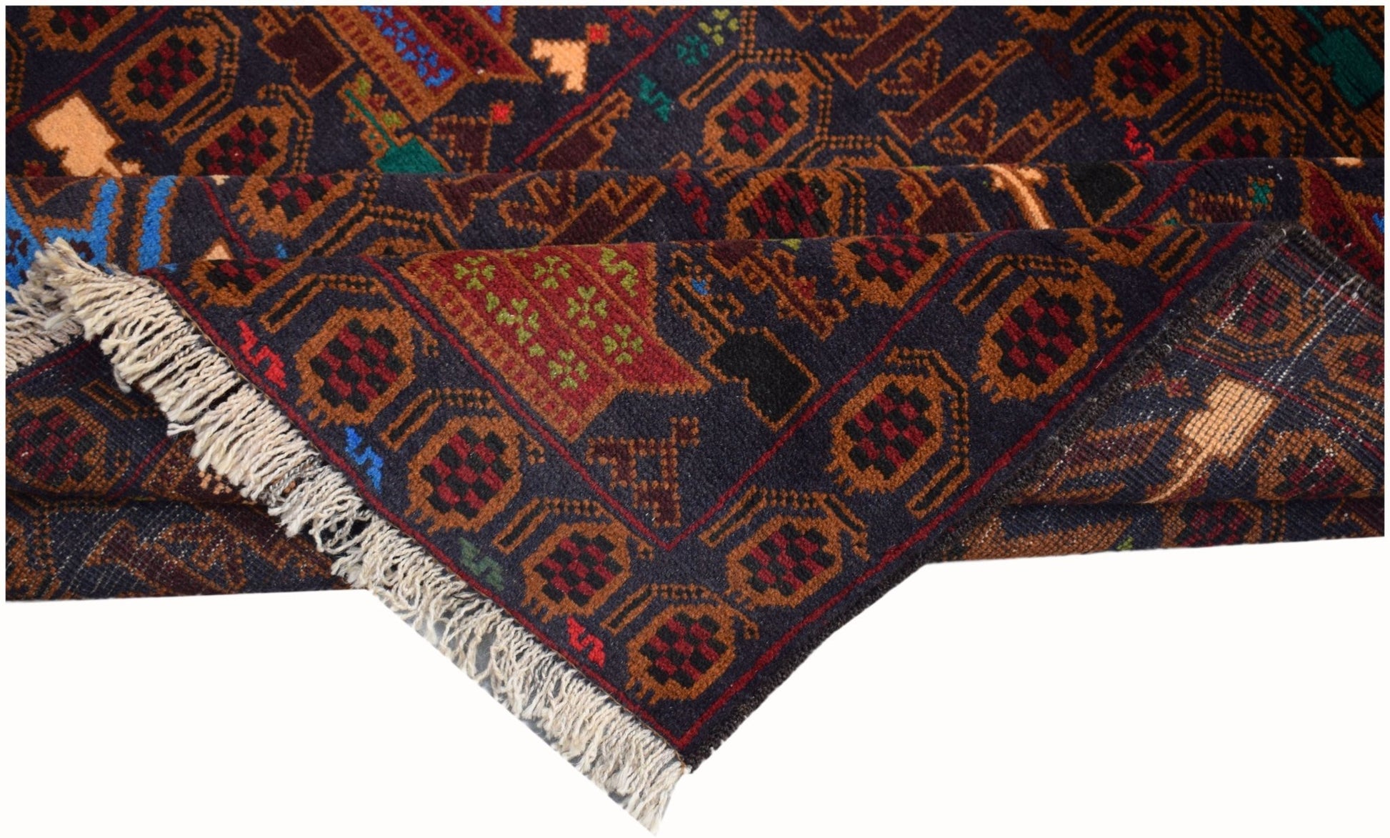 Handmade Afghan wool rug featuring traditional geometric patterns and a fringed edge.