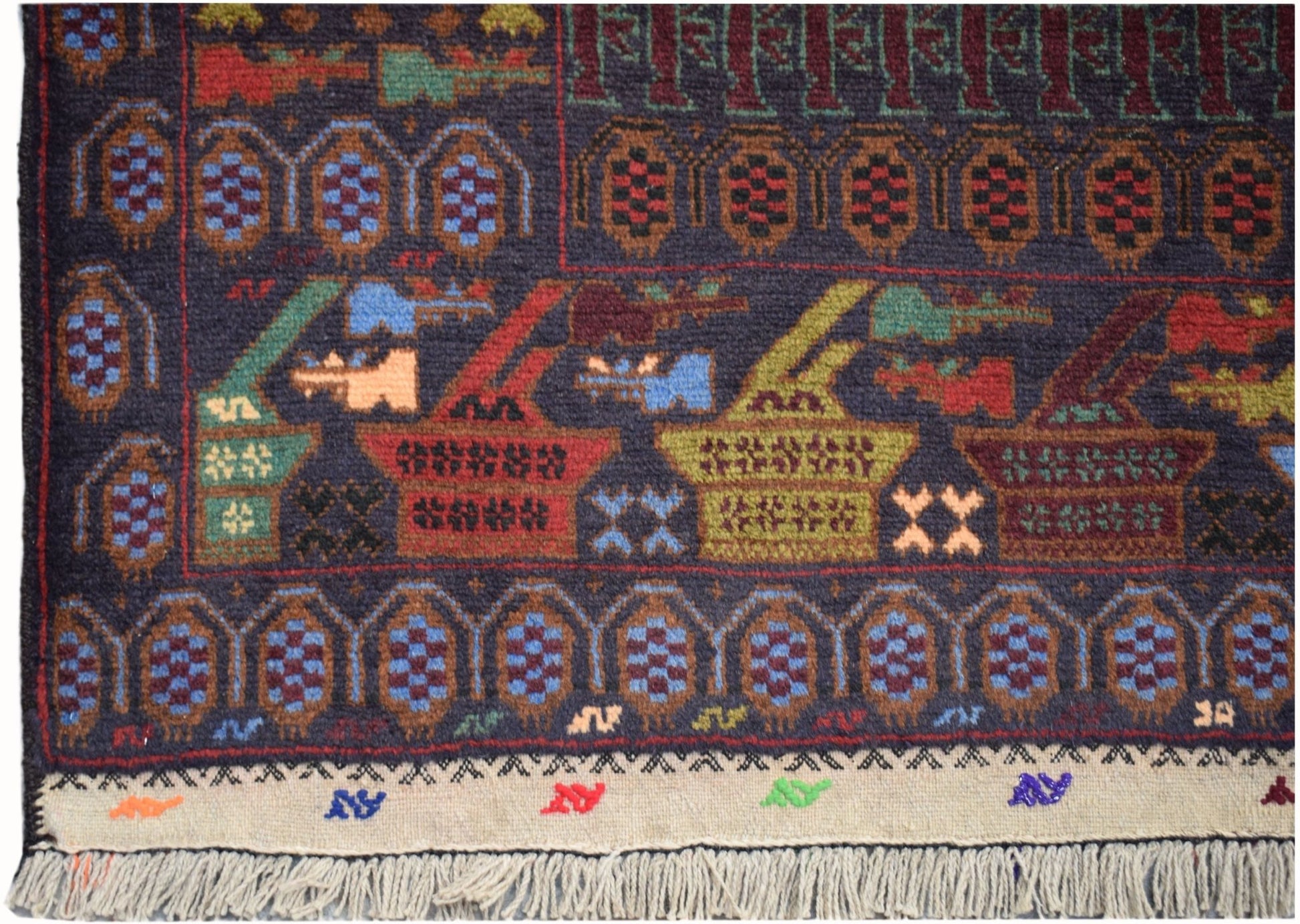 Handmade Afghan wool rug featuring traditional geometric patterns and stylized war motifs.