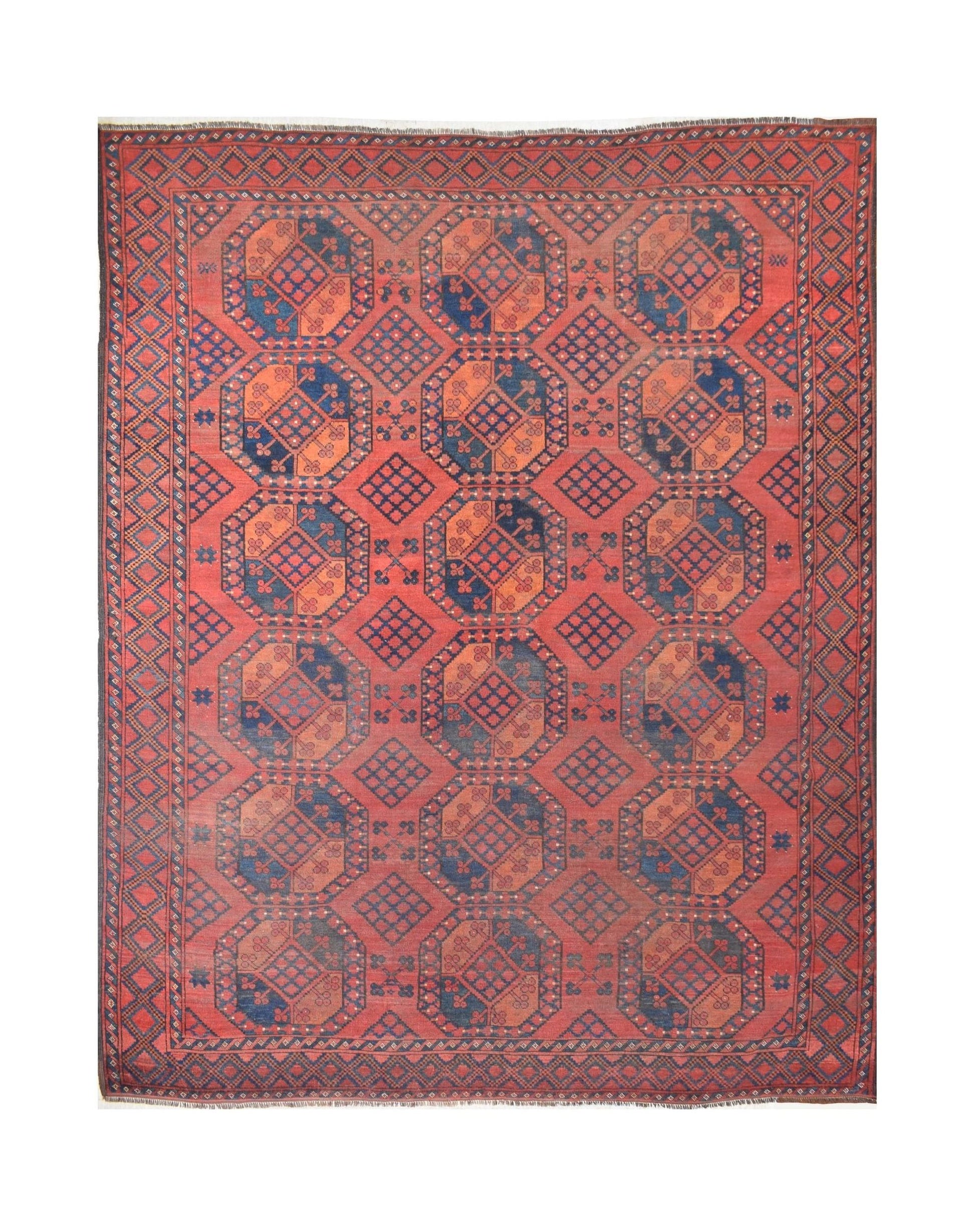 An antique Afghan Turkmen rug featuring a repeating red and blue elephant foot motif.
