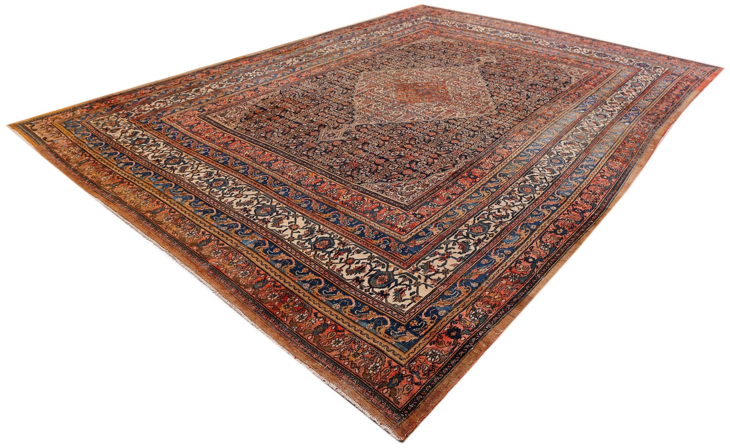 An antique Persian Senneh rug featuring a central medallion and intricate floral patterns.