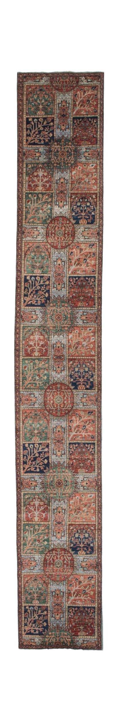 Handmade Afghan Chobi runner rug featuring a repeating geometric pattern of floral motifs.