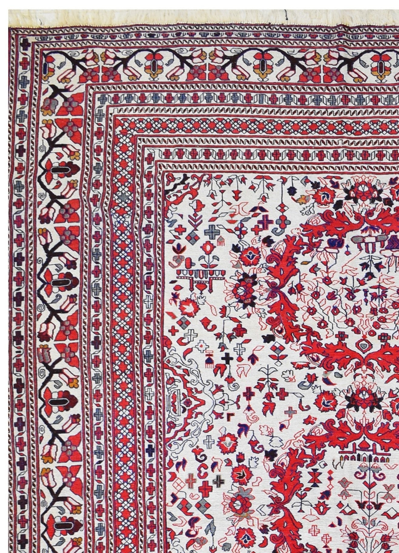 A vintage Afghan wool kilim featuring intricate red and black geometric floral patterns.