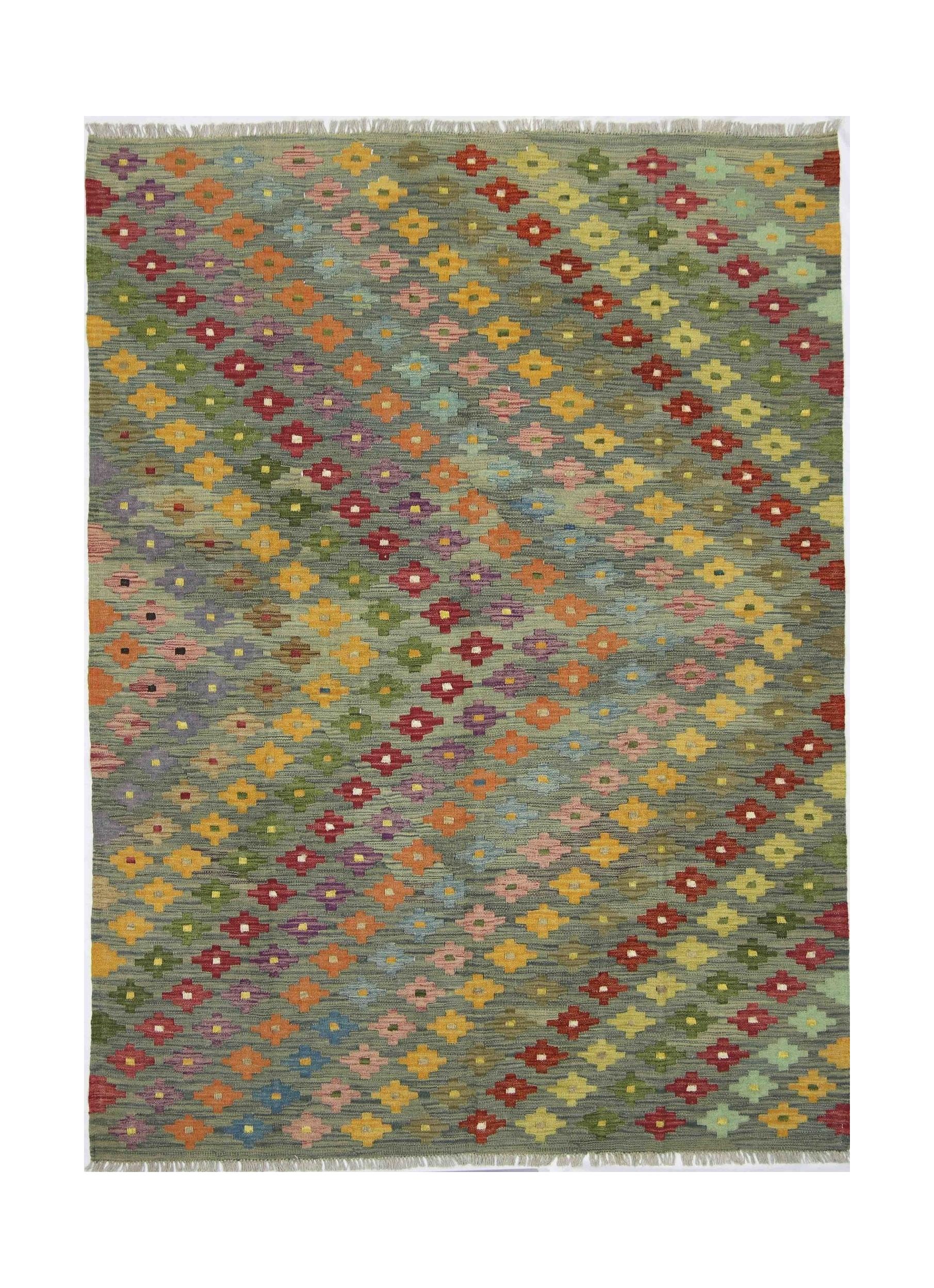 Handmade Afghan Maimana kilim rug featuring a multi-colored geometric floral pattern on green.