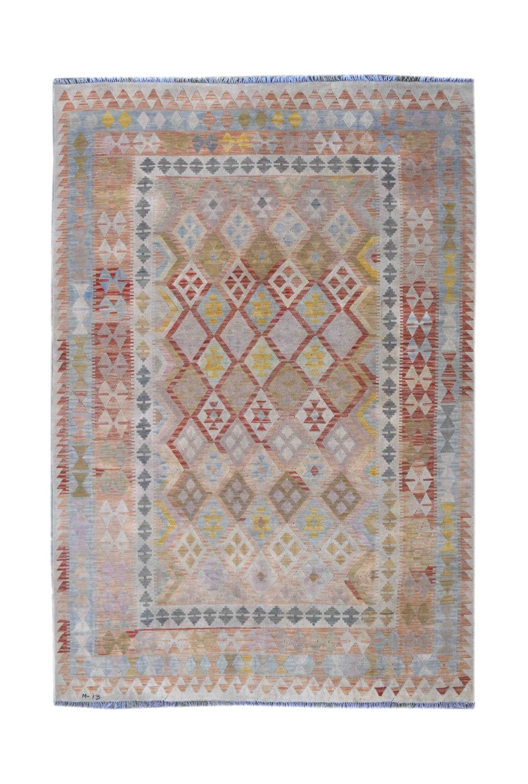 Handmade Afghan Maimana kilim rug featuring a geometric diamond pattern in soft, muted tones.