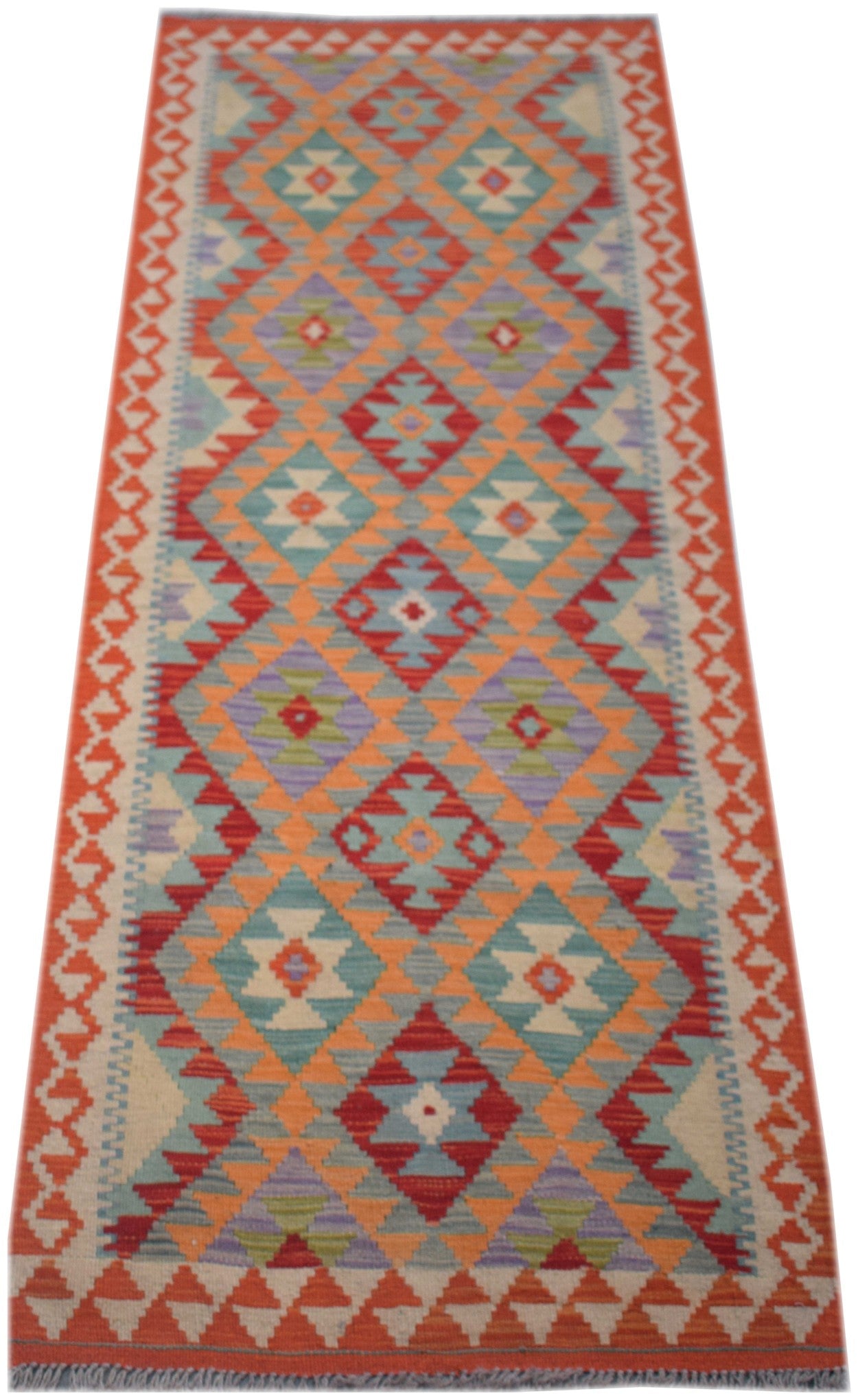 Handmade Afghan Maimana wool runner rug featuring a colorful geometric diamond pattern.