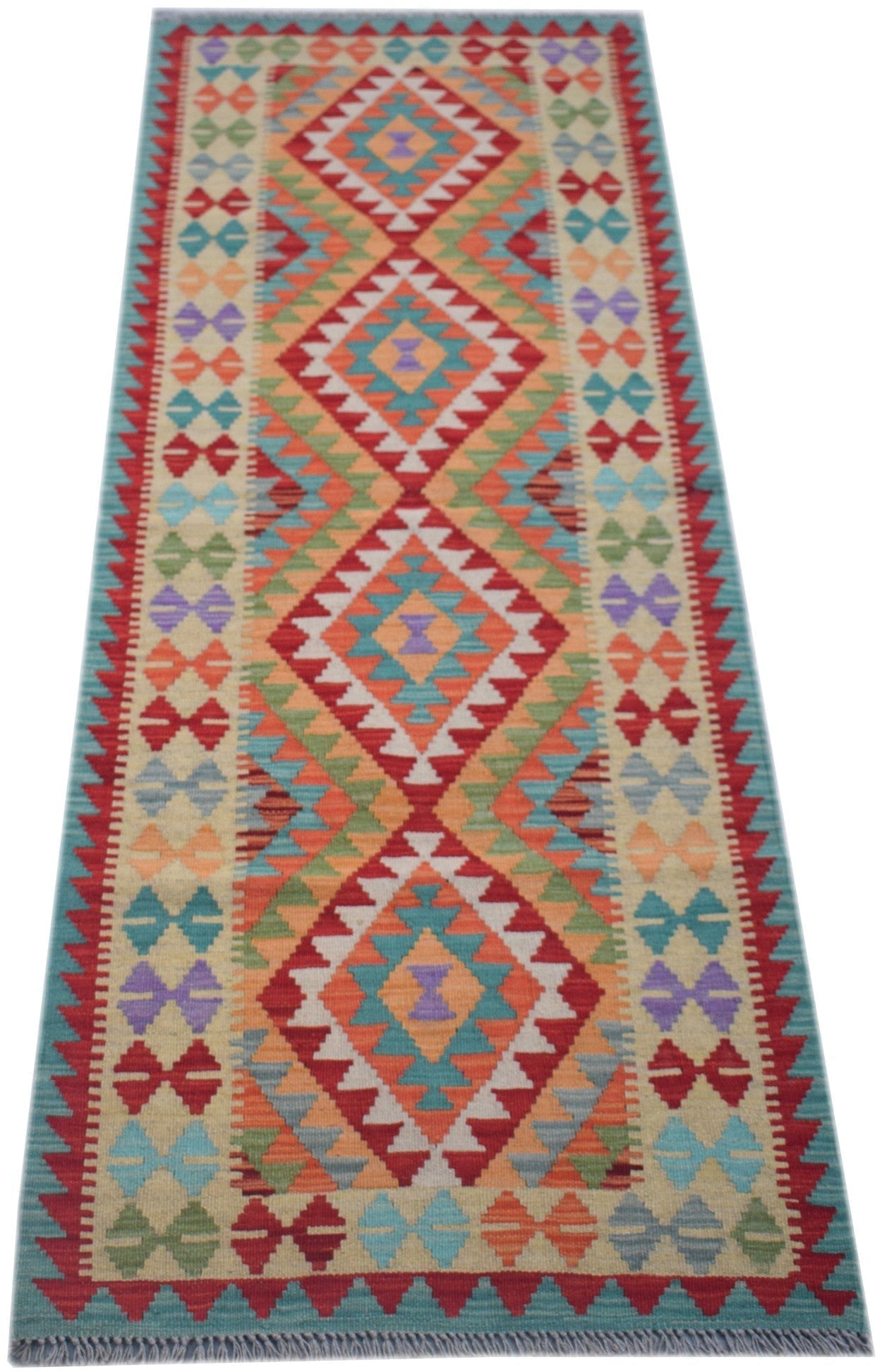 Handmade Afghan Maimana wool runner rug featuring a colorful geometric diamond pattern.